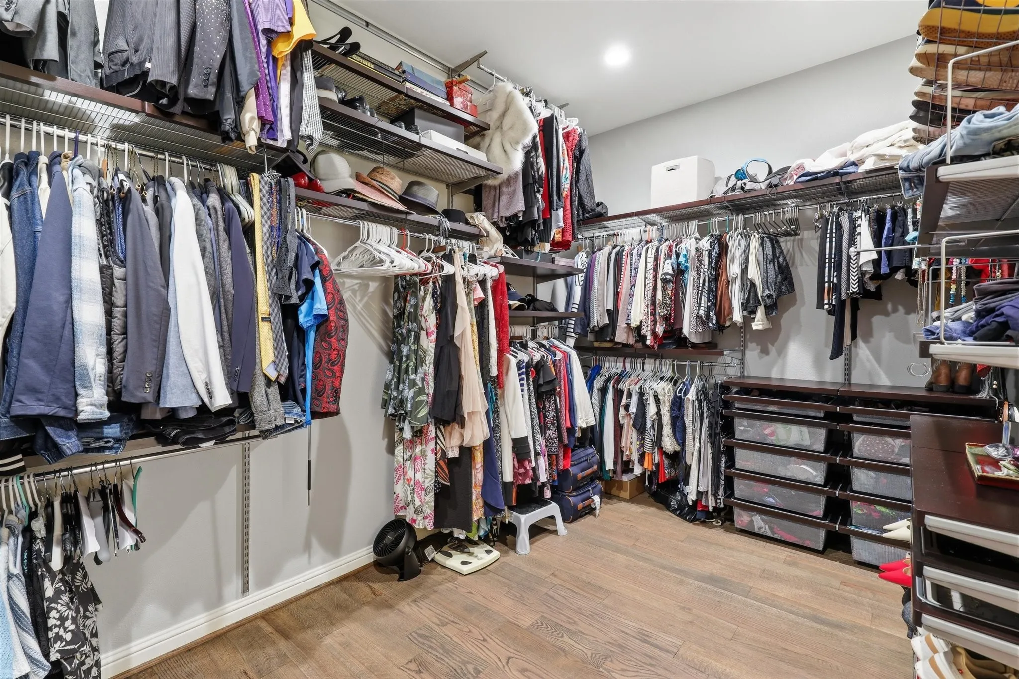 Large closet in the Primary offers a custom closet system!