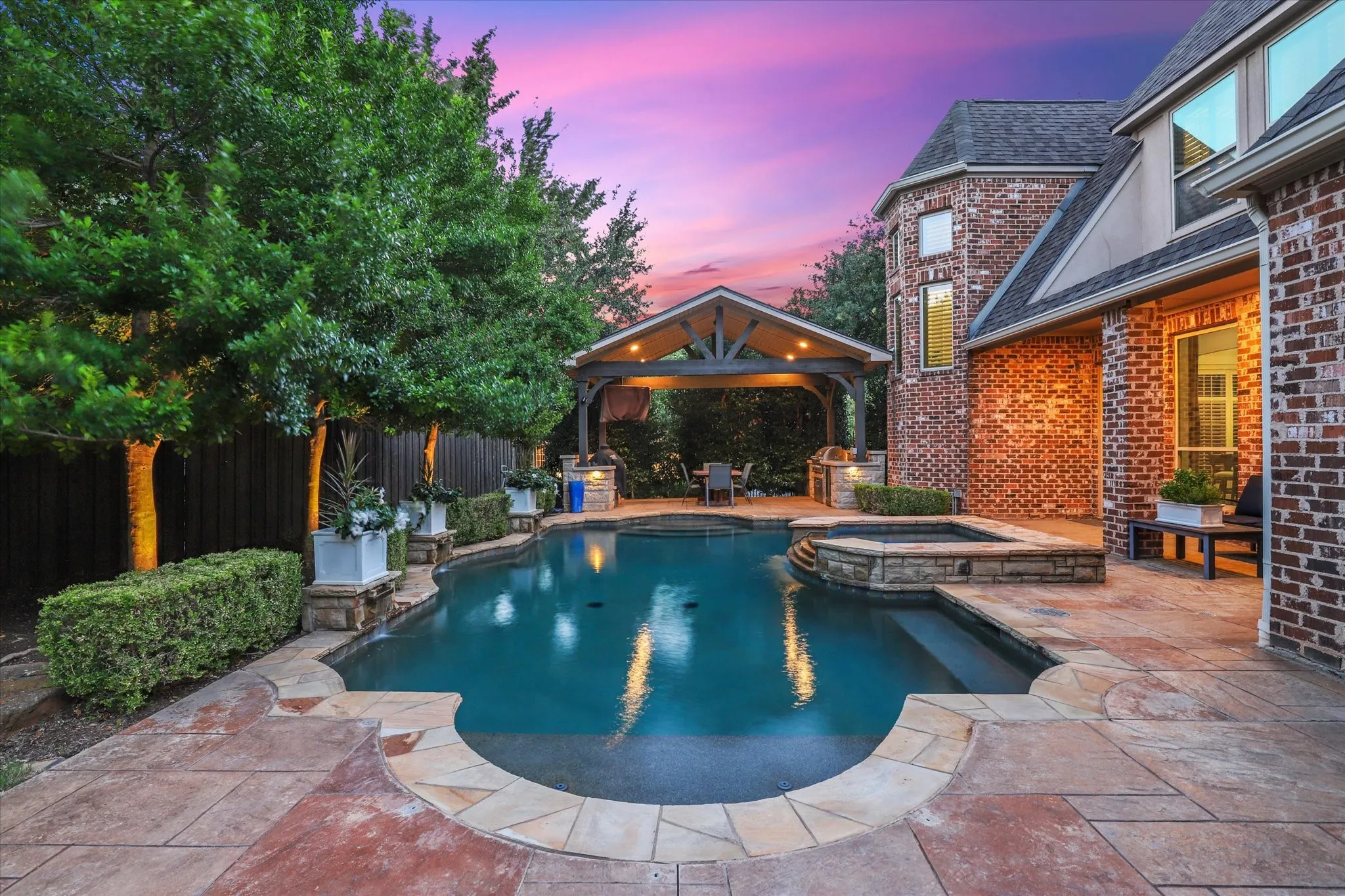 The back yard offers a pool/spa and outdoor Kitchen area with plenty of yard leftover (see other photos).