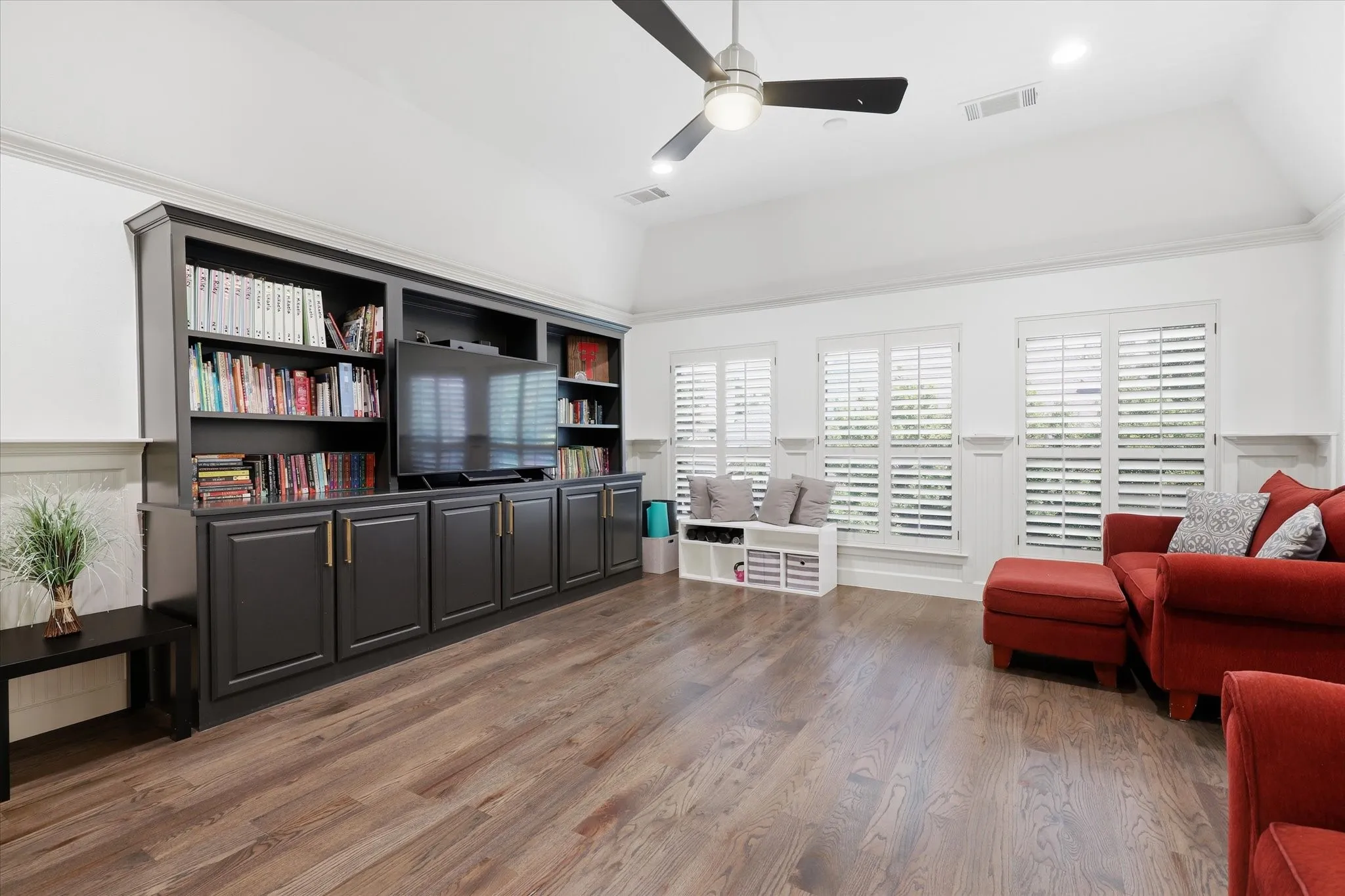 The 2nd Floor Game Room doesn't disappoint, with wood flooring and built-ins.