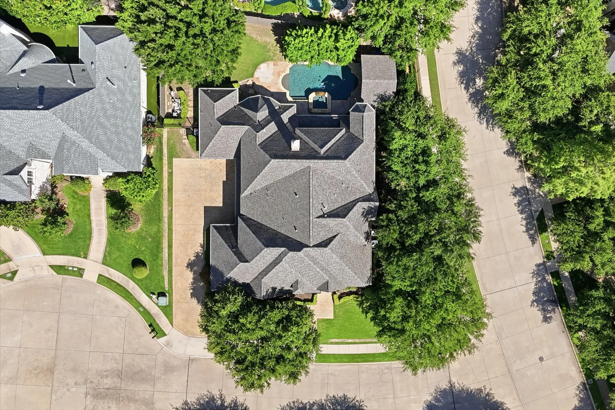 Aerial view of the home on it's corner lot.