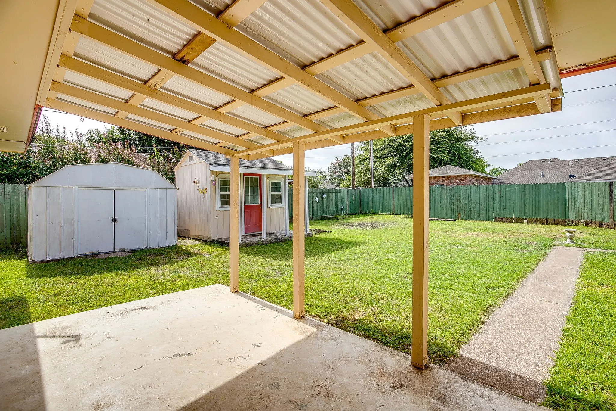 Yard has shed and craft shop