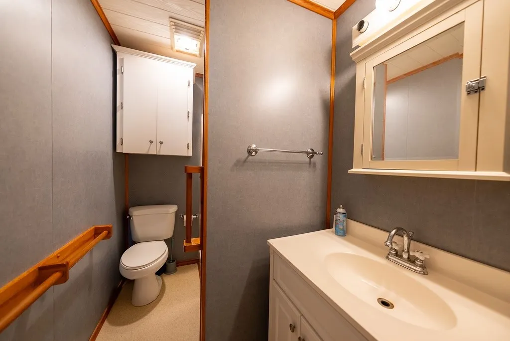 Bathroom vanity with integrated sink and chrome​​‌​​​​‌​​‌‌​‌‌​​​‌‌​‌​‌​‌​​​‌​​ faucet