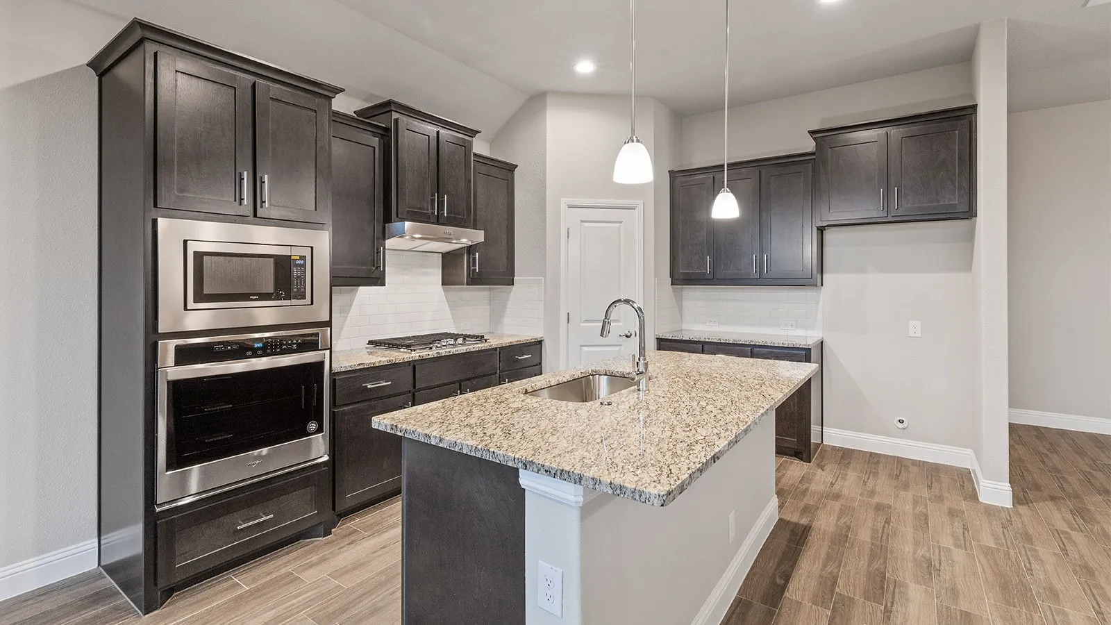 Kitchen - All Home and community information, including pricing, included features, terms, availability and amenities, are subject to change at any time without notice or obligation. All Drawings, pictures, photographs, video, square footages, floor plans, elevations, features, colors and sizes are approximate for illustration purposes only and will vary from the homes as built.
