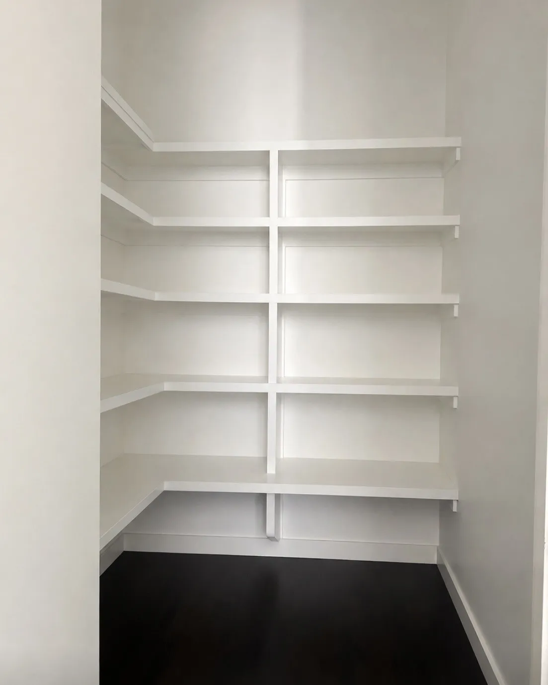 Built-in shelving with white finish