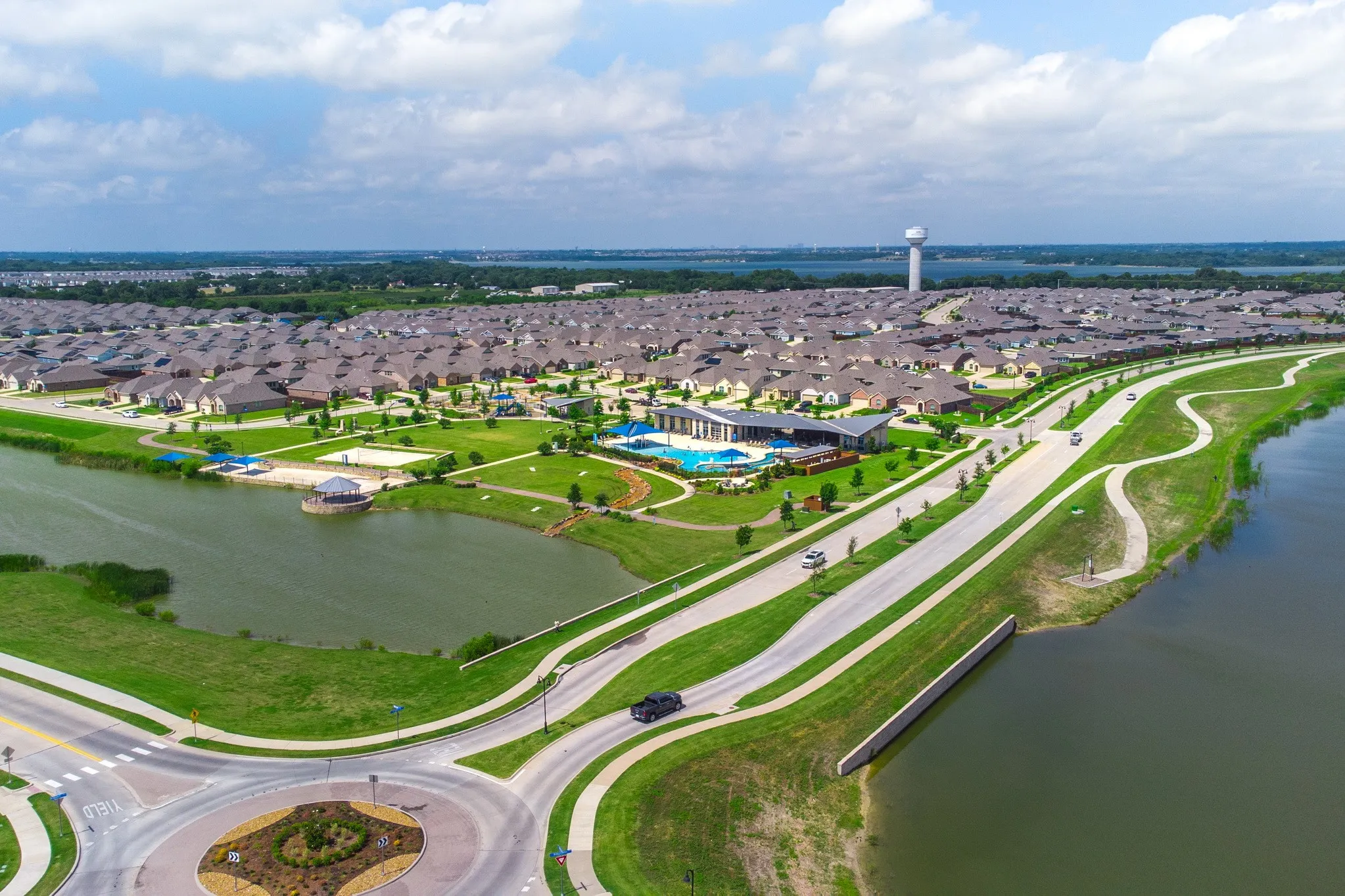 Aerial perspective showcasing a residential community with abundant green spaces