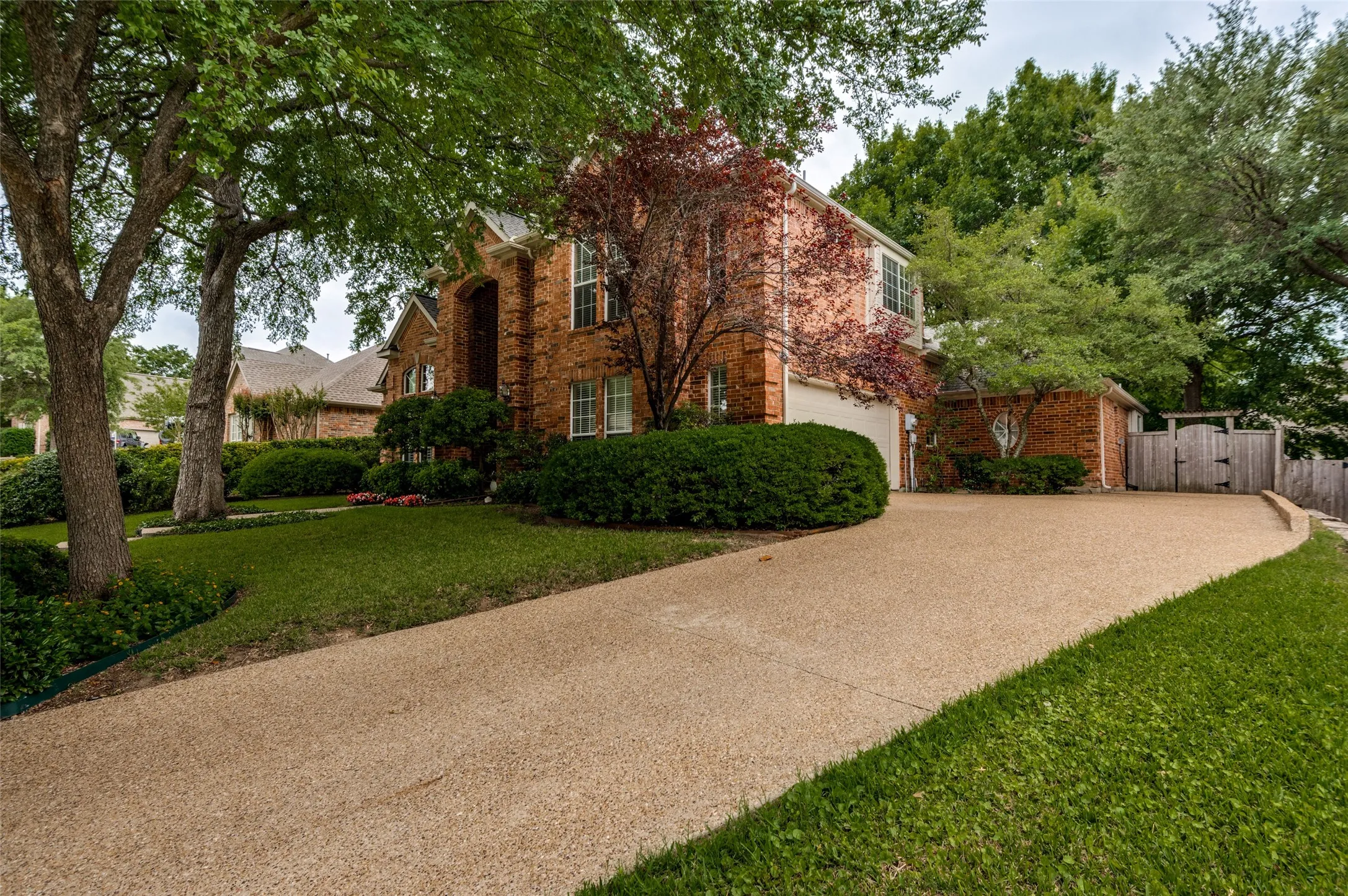 The driveway and walkway to the home was recently replaced along with the back patio.