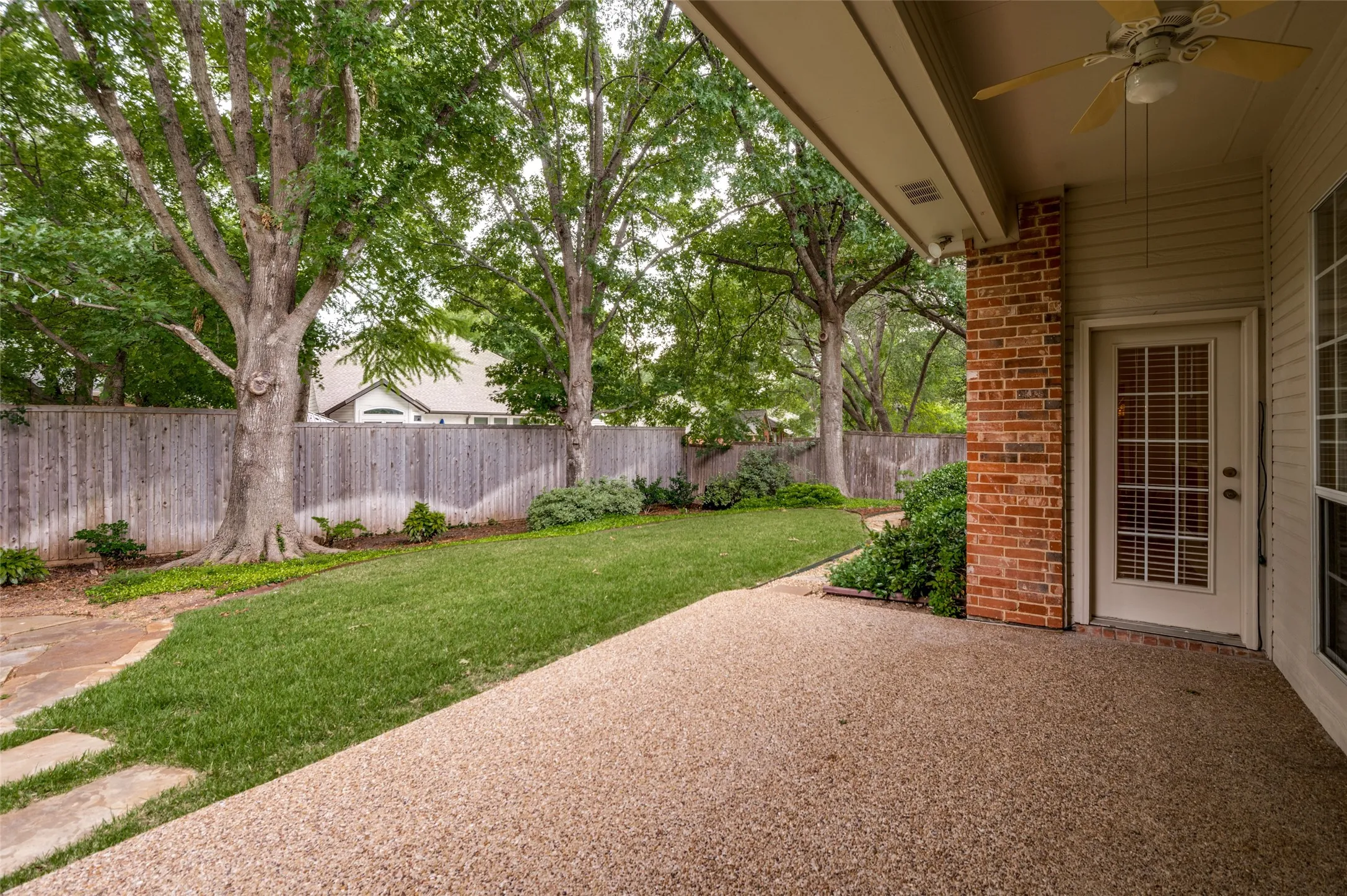 Covered patio and large back yard.
