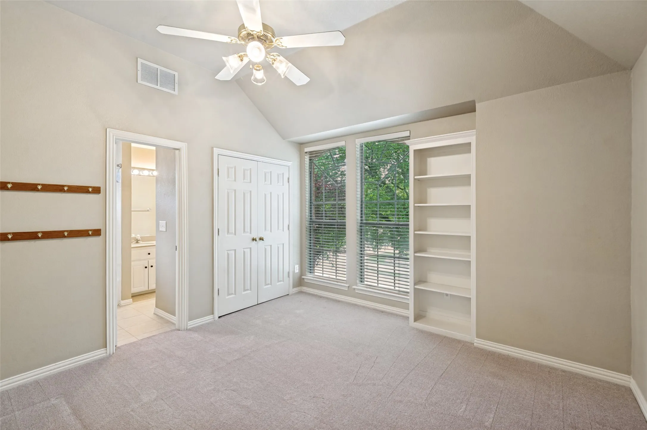 Two of the bedrooms share the jack & Jill bathroom with dual sinks, and tub with shower.