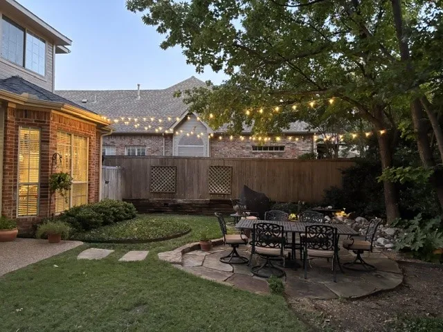 Lush landscaping and large yard.