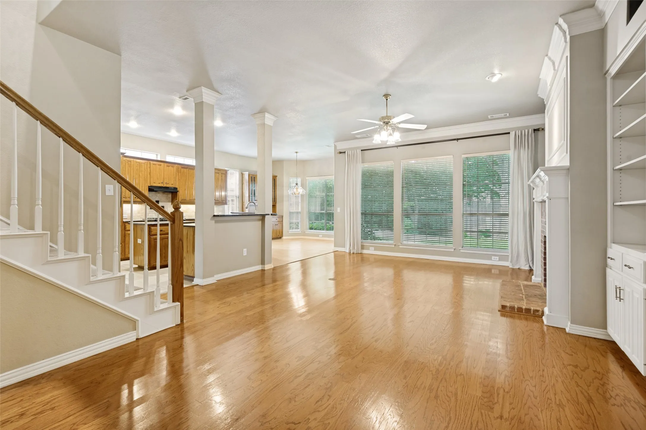 With a dual stairway and direct access to the kitchen the floor plan is convenient and offers ample natural lighting.