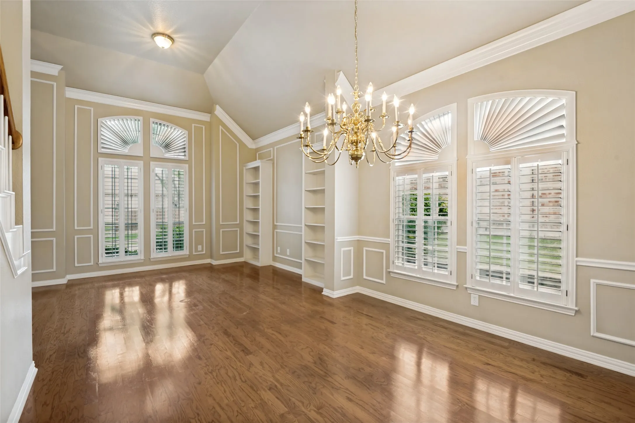Window shutters and built ins complete the living area.