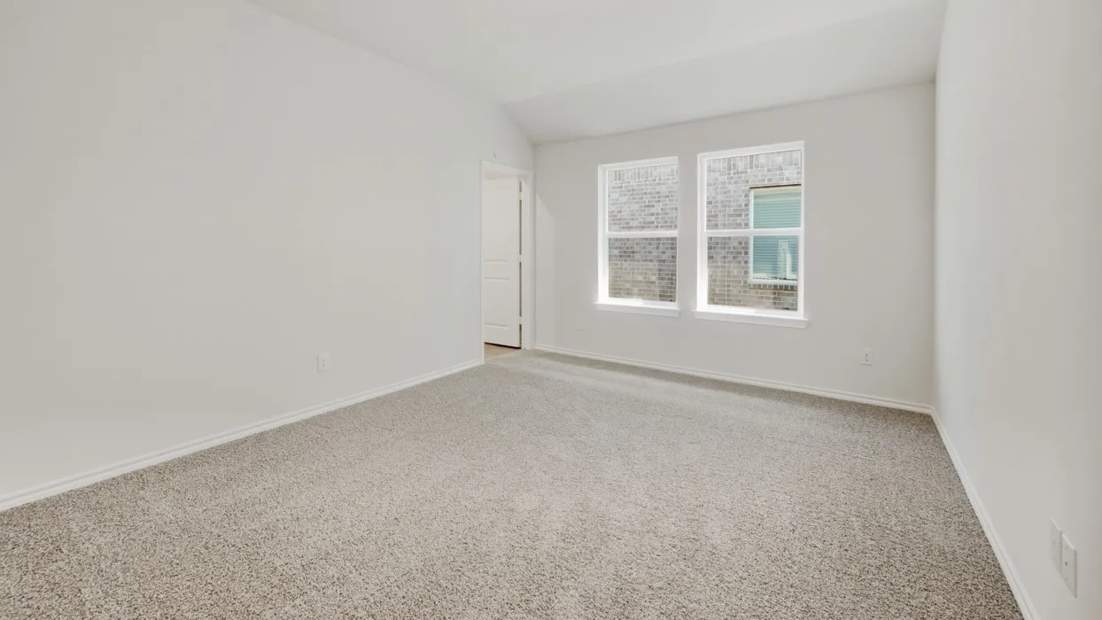 Neutral tone wall paint with two windows providing natural light