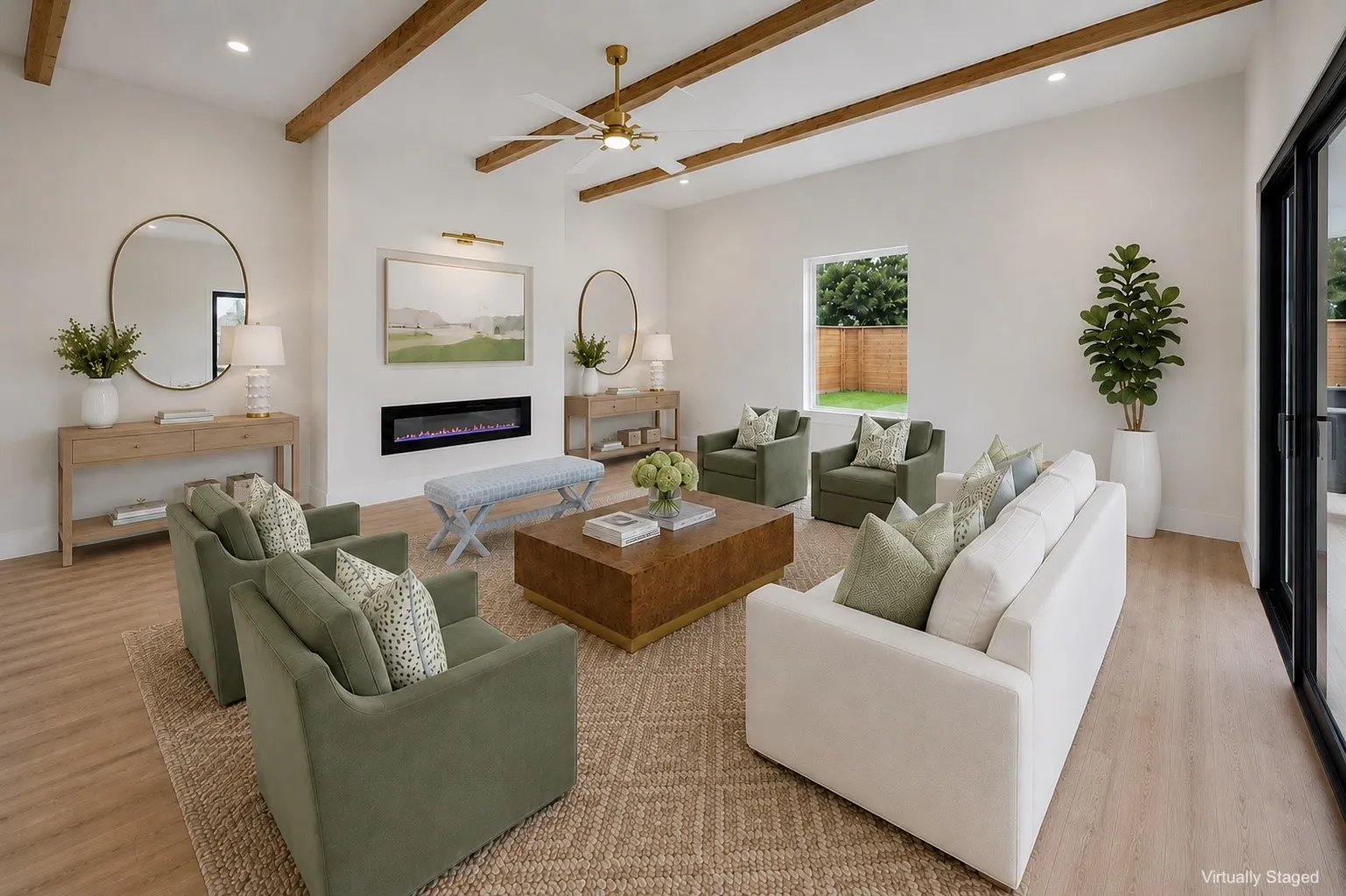 Spacious living area featuring exposed wood-finish ceiling beams, an integrated linear electric fireplace, wood-finish flooring, and large sliding glass doors