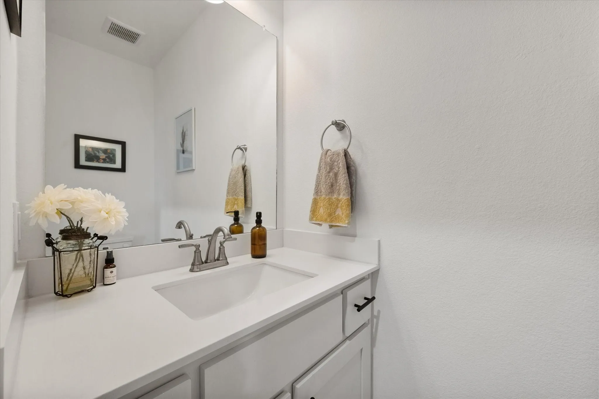 Half bathroom conveniently located on the first floor.
