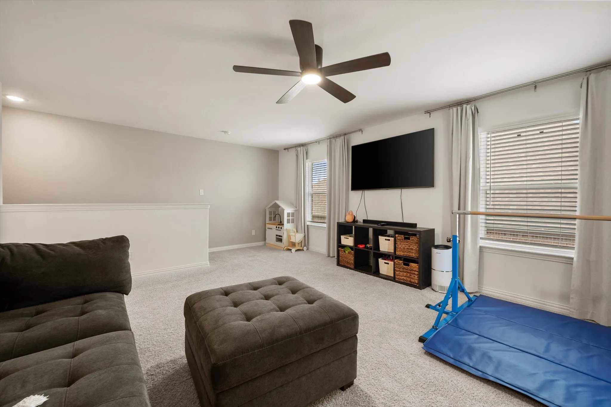Second floor game room offers an additional living space for a variety of needs.