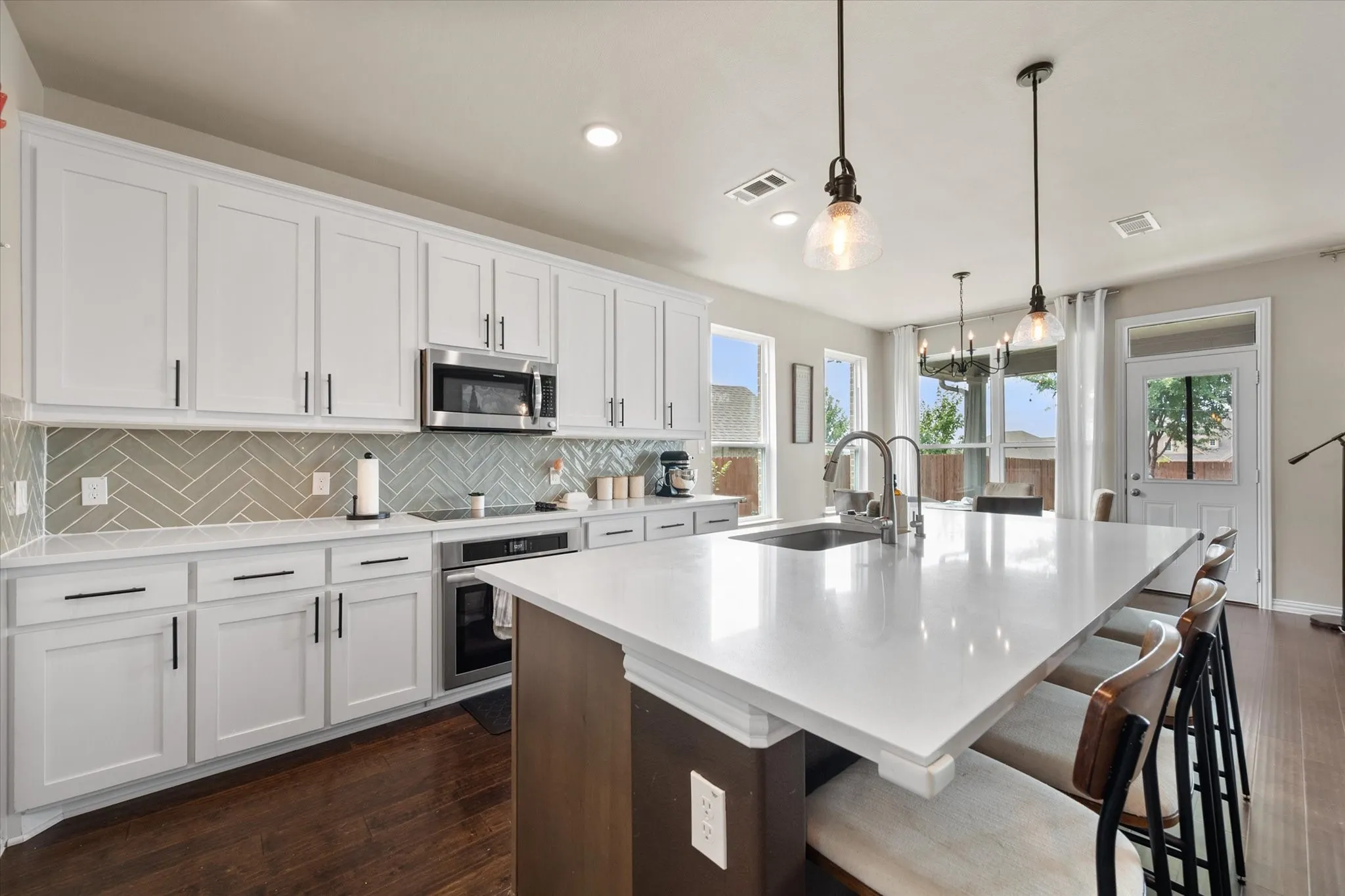 Large center island offers extra dining space.