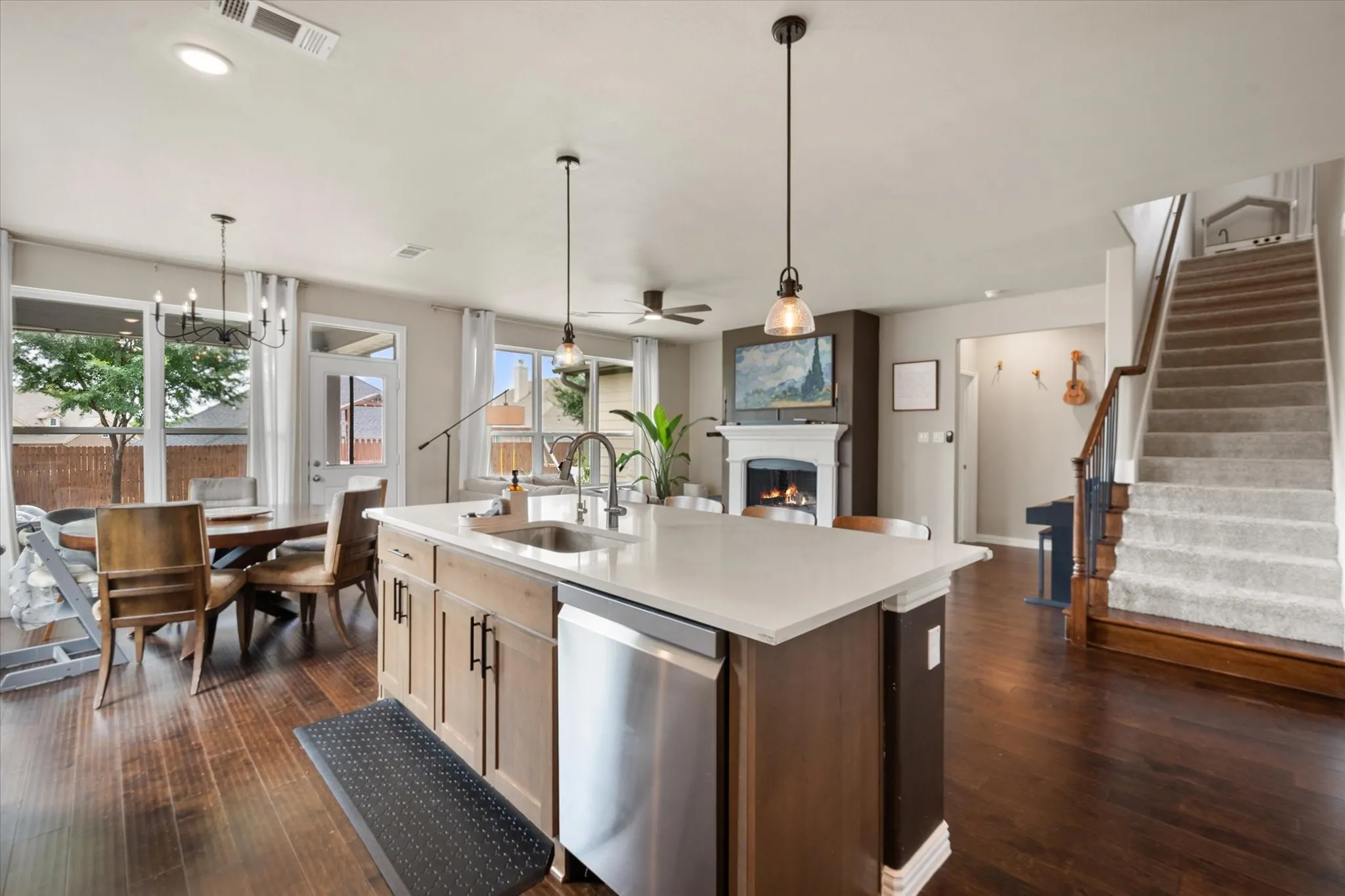 Kitchen has matching stainless steel appliances.
