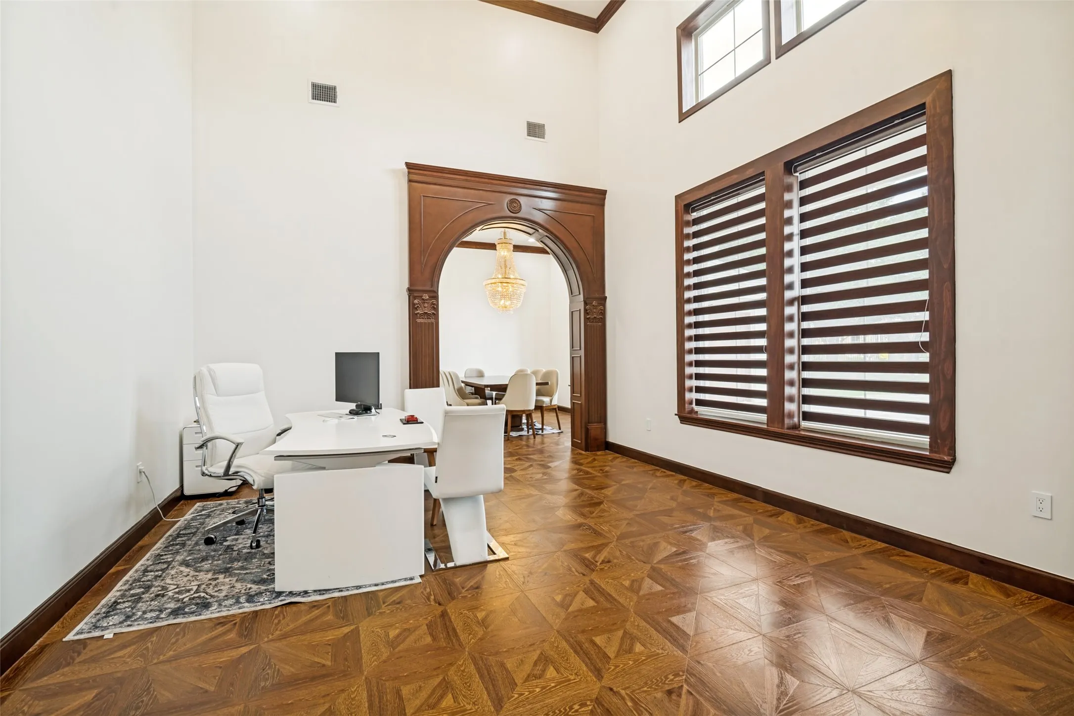 Formal Living Room - detailed wood door framing - , wood floor, shades
