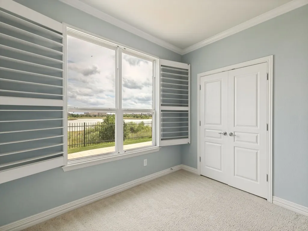 Bedroom 3  Features an Ensuite Bath and is located across from the Kitchen and Laundry Area of the Home. An ideal guest retreat!