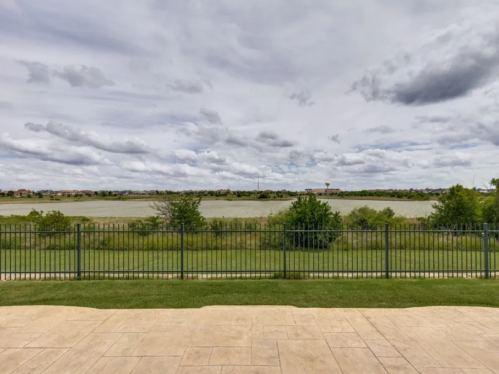 1457 Harbor Springs is on a premium waterfront lot in Frisco Lakes. Offering 3 Bedrooms, 3.5 Bathrooms,2 Living Areas and a Fantastic 2.5 Car Garage with epoxy coated flooring. Upgraded to include custom features.