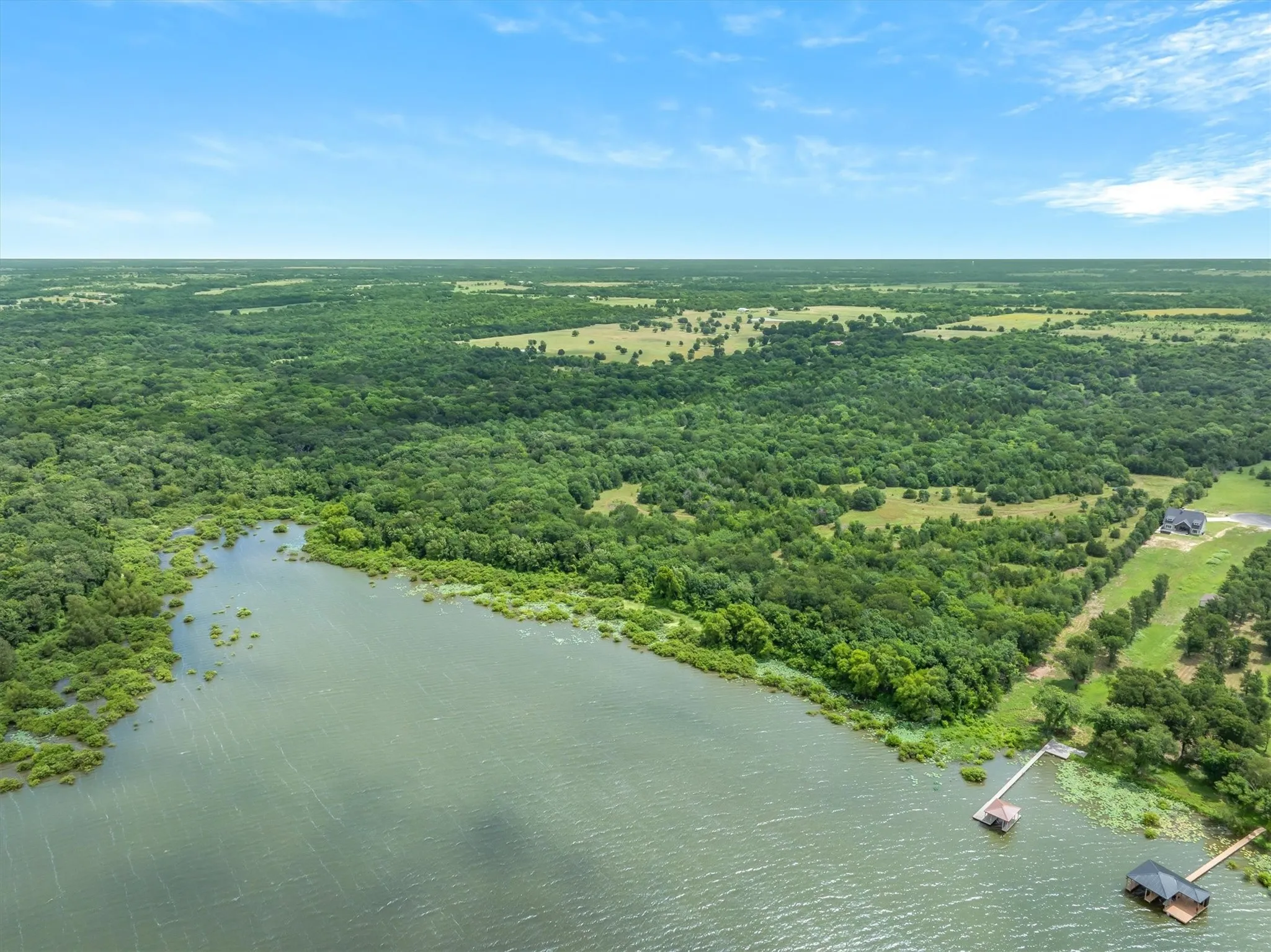 The depth of the Sabine River Authority land is from approx. 400' to as much as 1000' along the waters edge, mostly flood plain contained within the SRA land.