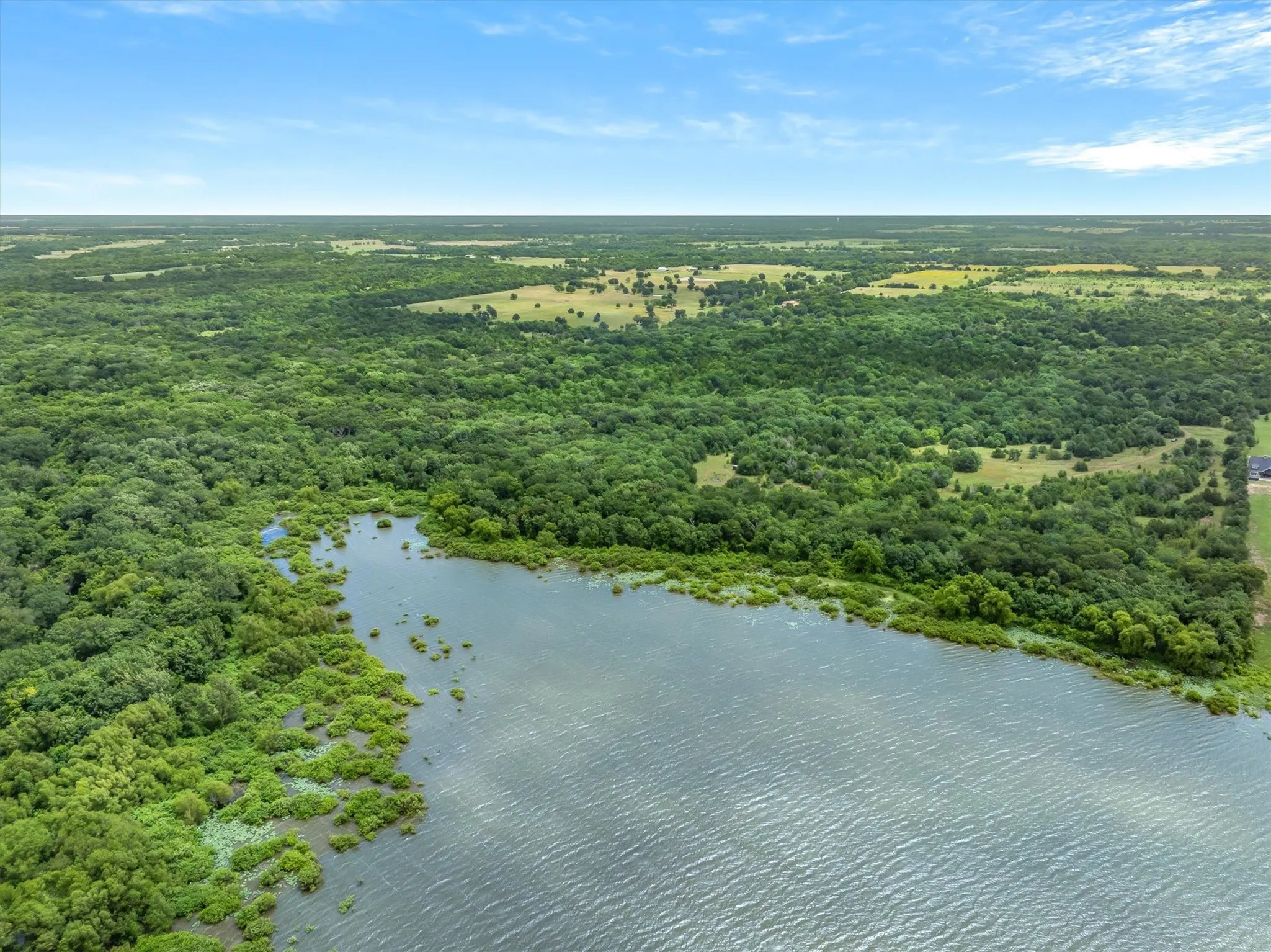 Sabine River Authority is a strip along the lake measuring approx. 400-1000 ft mostly flood plain caused by Tawakoni water shed. There is very little flood plain on the ranch itself.