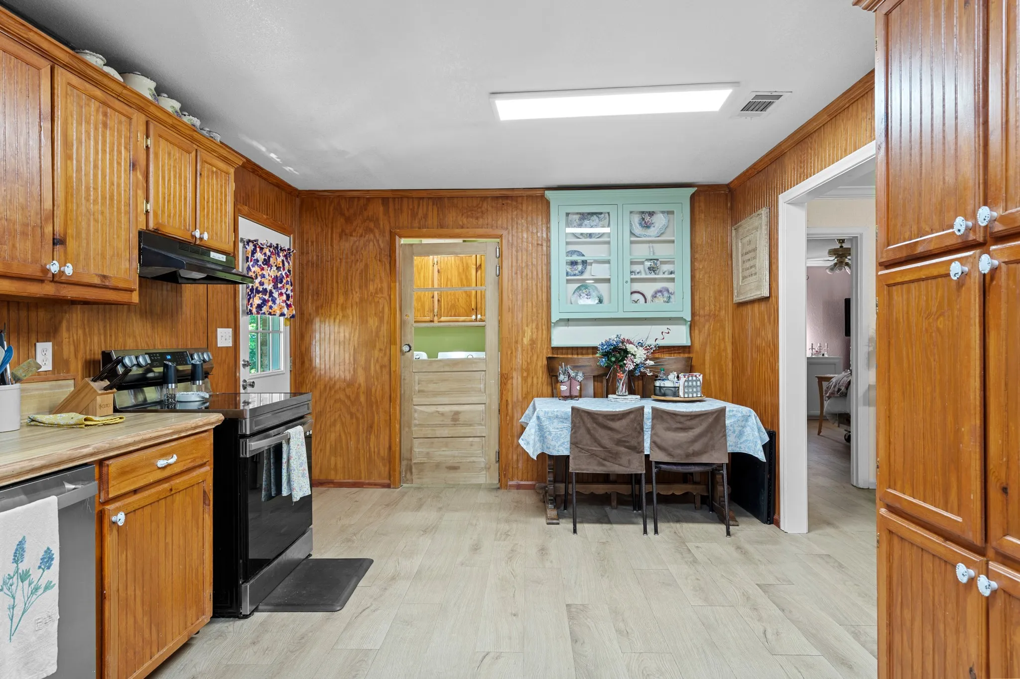 Laundry off kitchen for easy multti-tasking.
