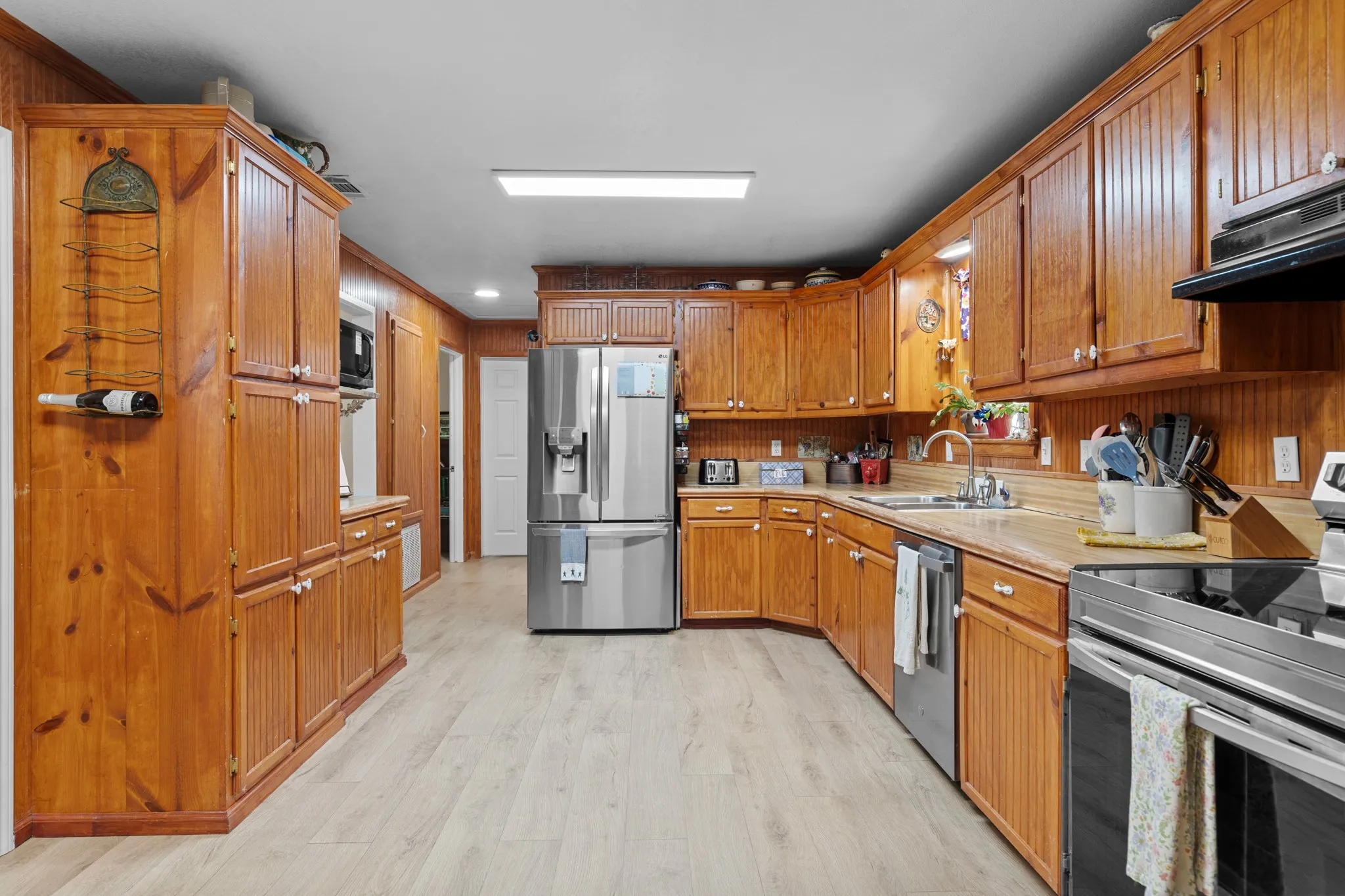 Perfect social kitchen, where guests naturally gravitate and conversation flows.