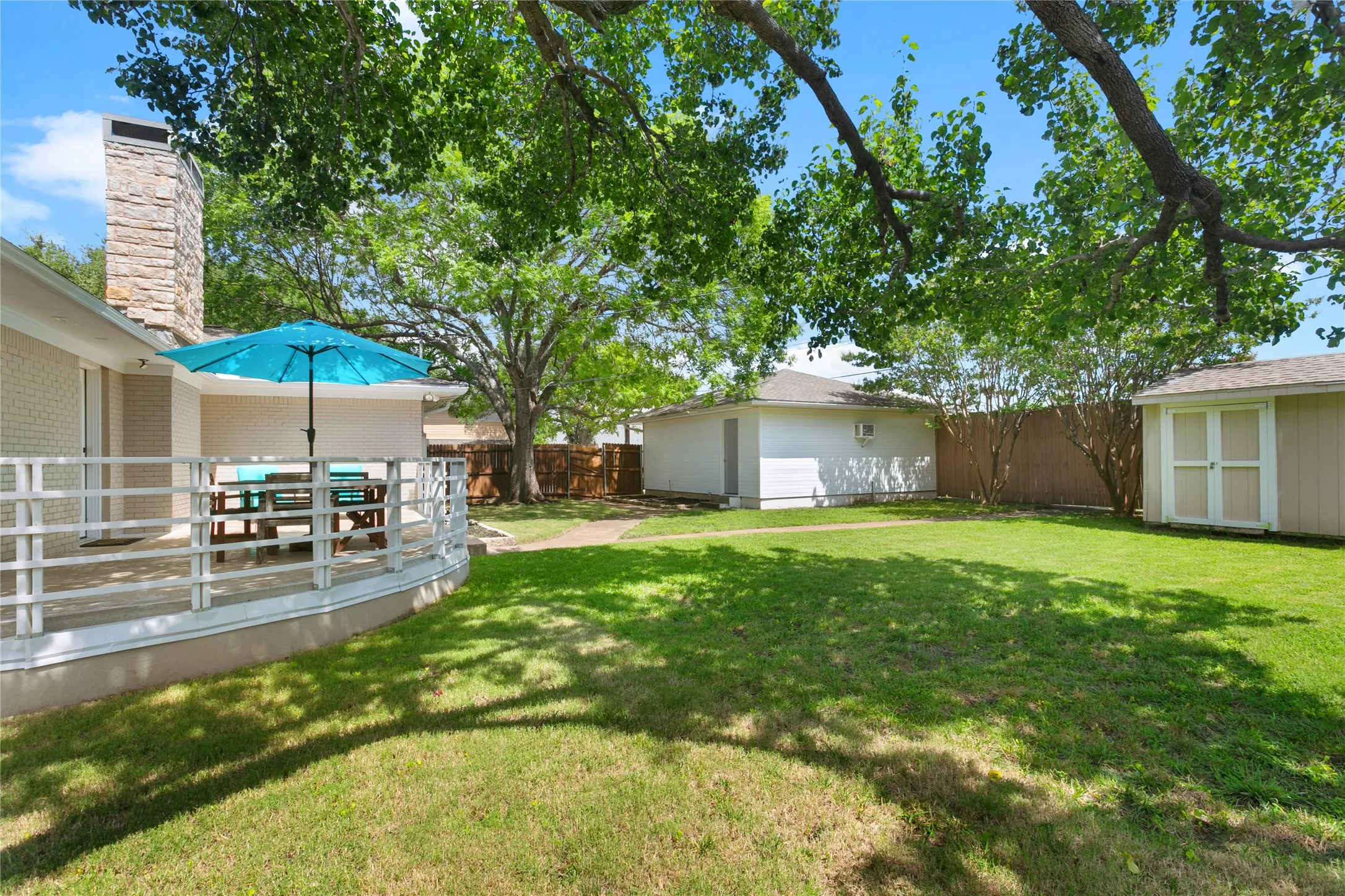 Beautiful mature trees in backyard