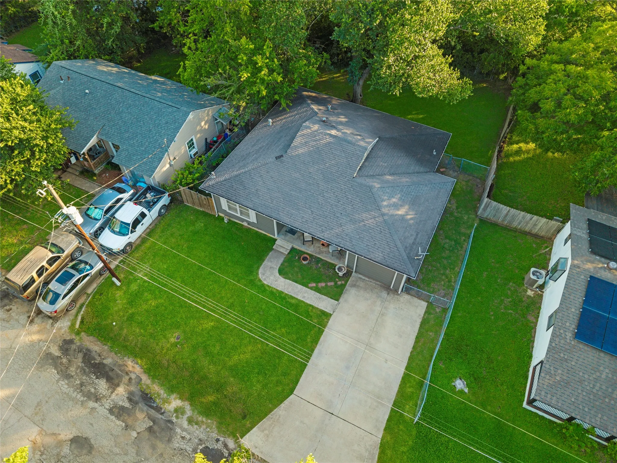 Aerial view showcases the home's location within the surrounding neighborhood.