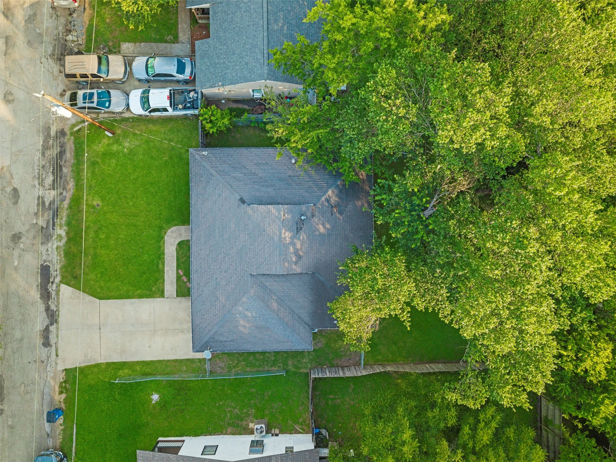 Aerial view showcases the home and surrounding neighborhood from above.