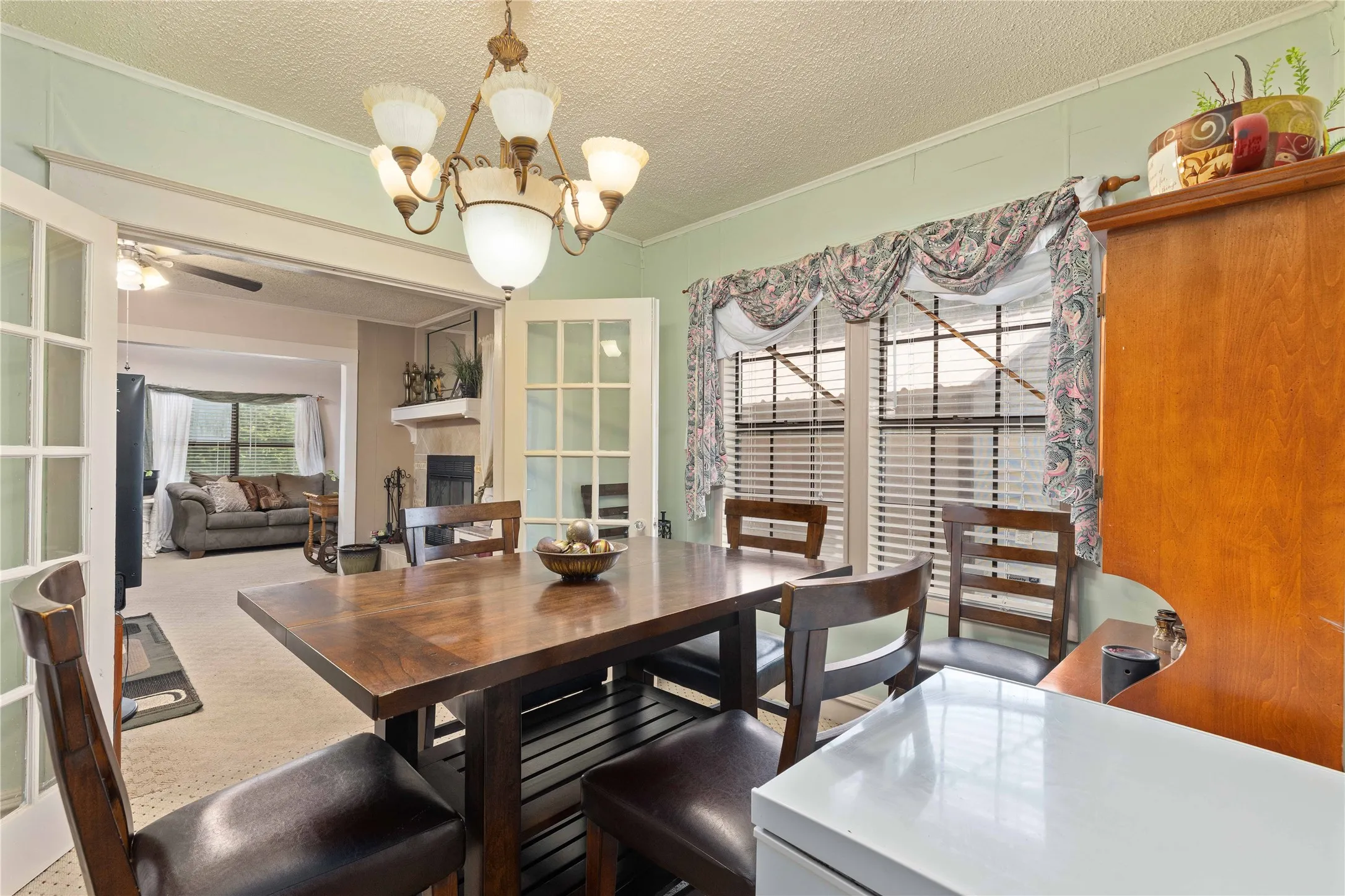 French doors between the living room and dining room