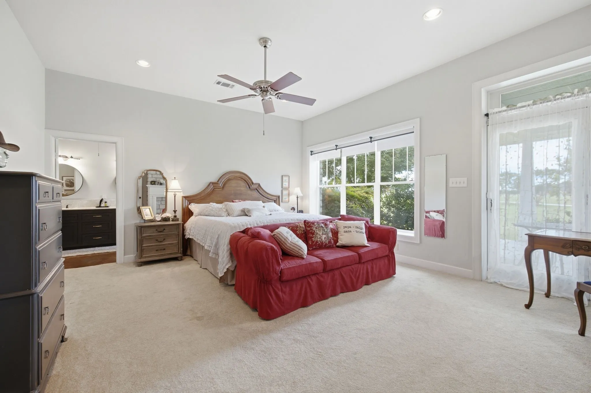 Giant bedroom with enough space for sitting area.