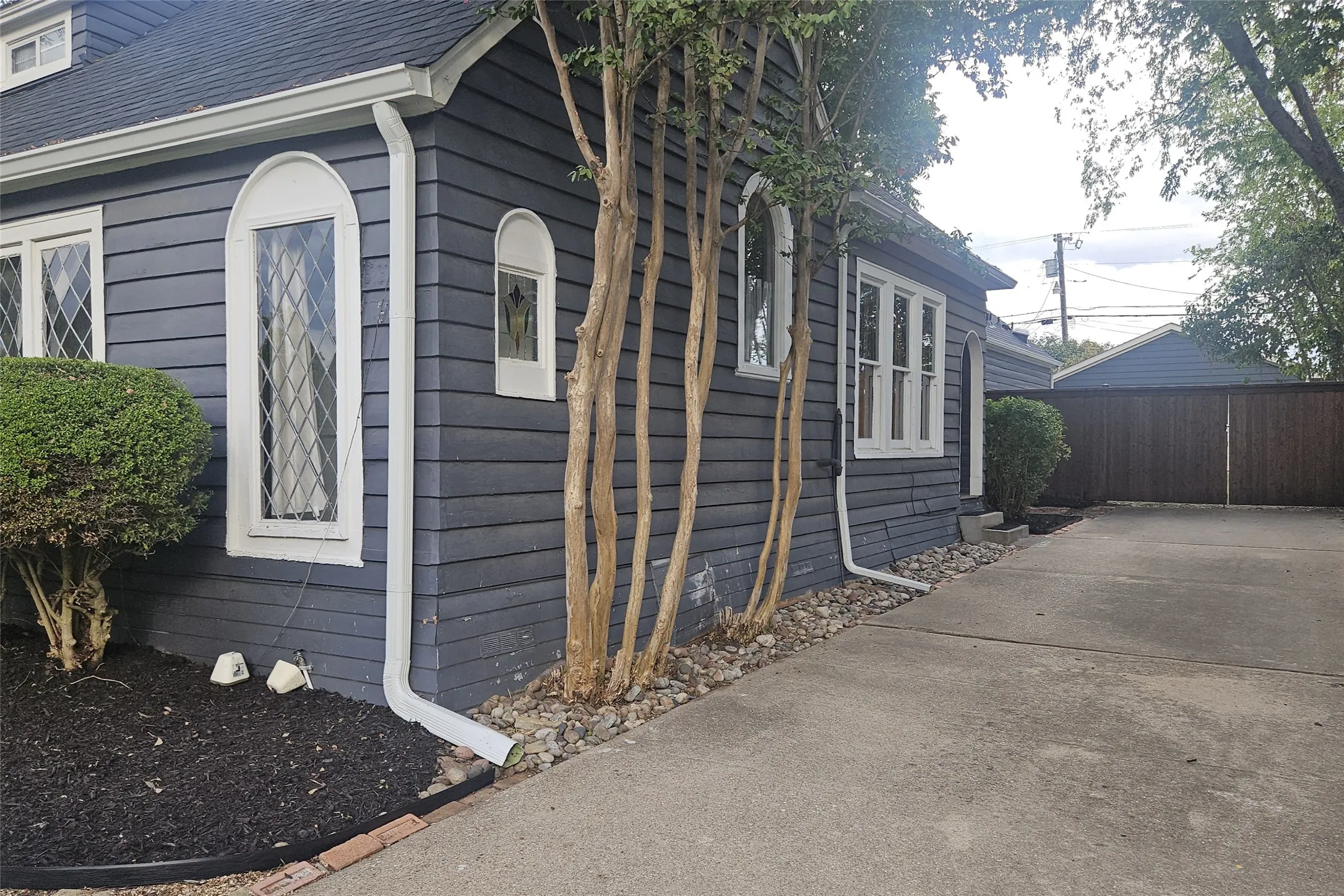 Driveway with another entrance to the home
