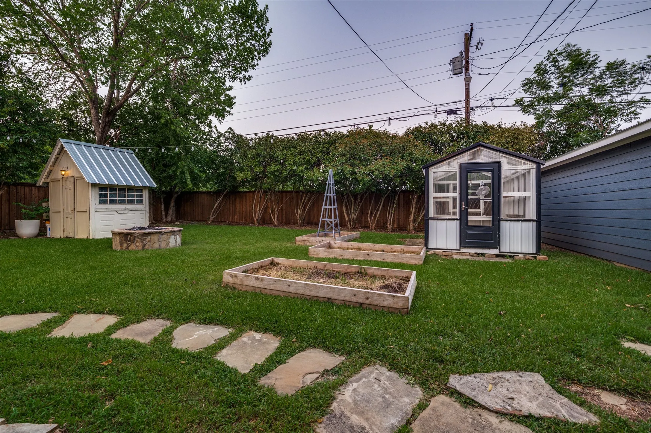 Green House, chicken house and raised garden beds.