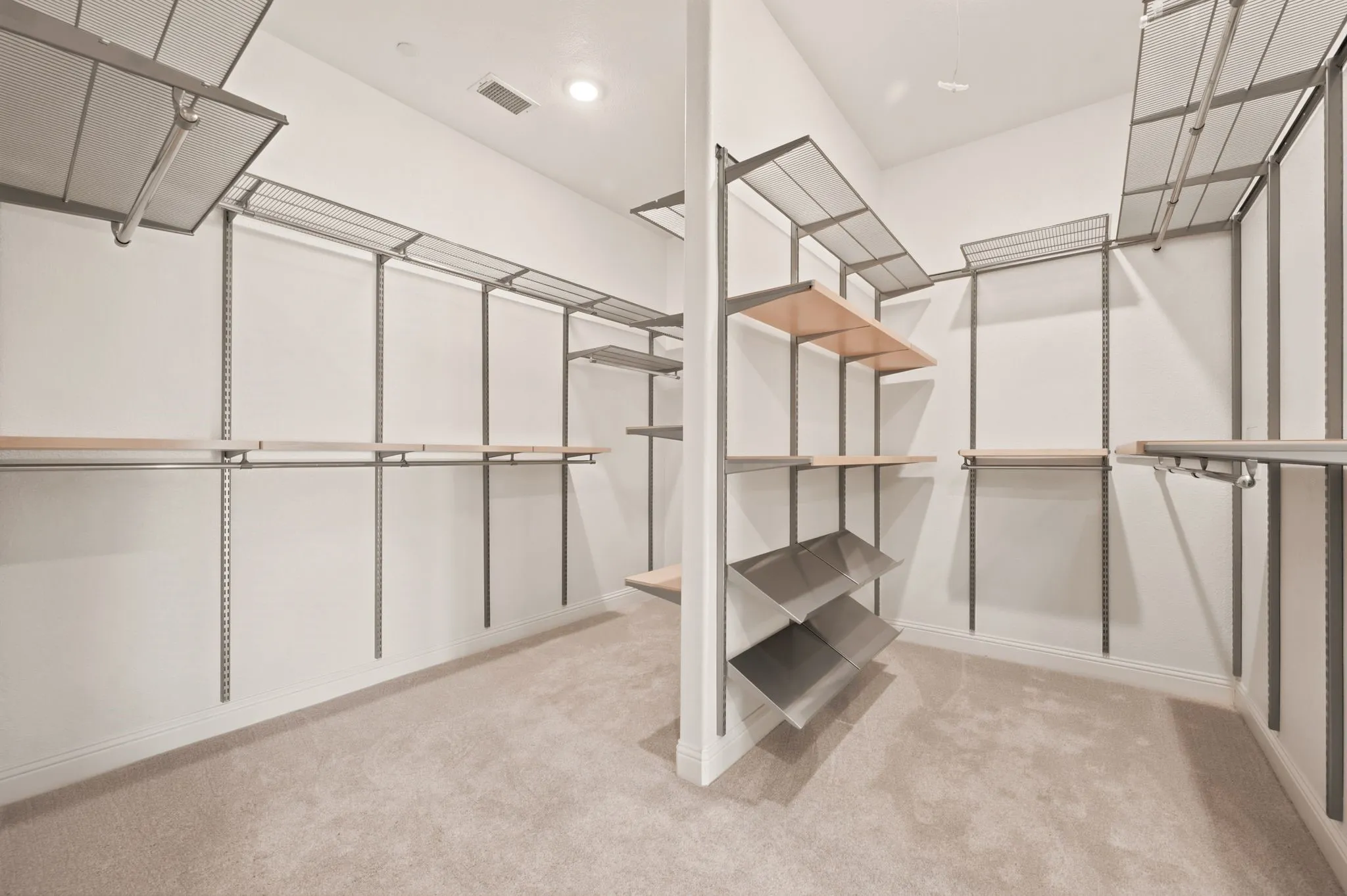 The Primary Suite has a custom closet system designed by The Container Store providing excellent storage space.