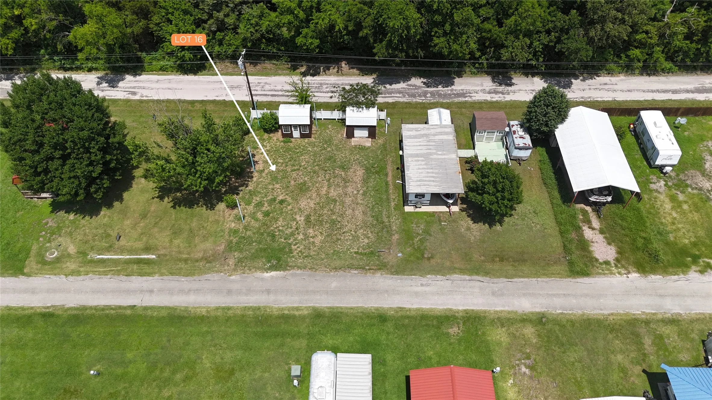Aerial boundary view showing Lot 16 between Blue Heron Way and Pelican Isle Drive.