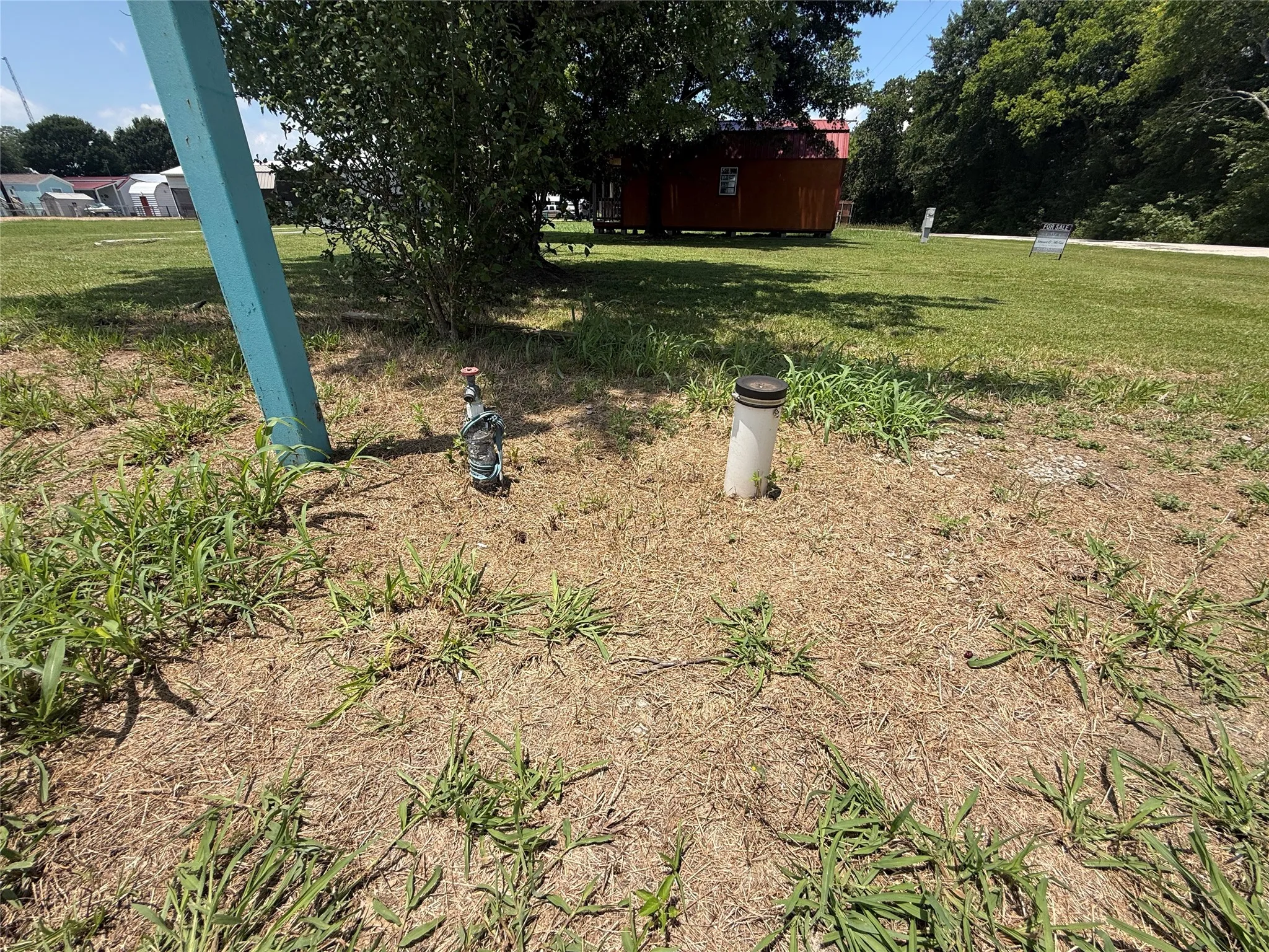 Utility access visible on the lot for future use and convenience.