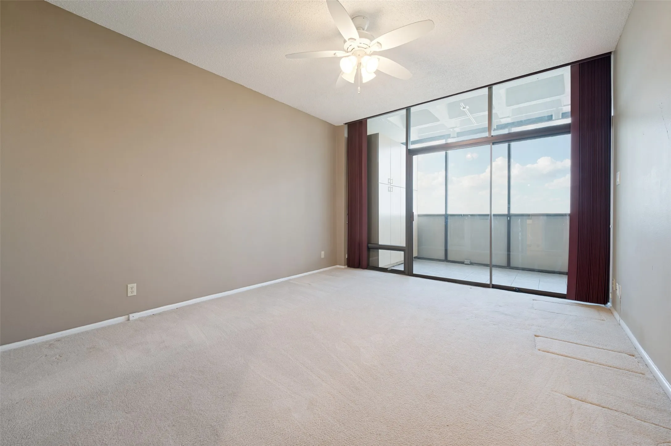 2nd bedroom with access to the enclosed patio/sun room.