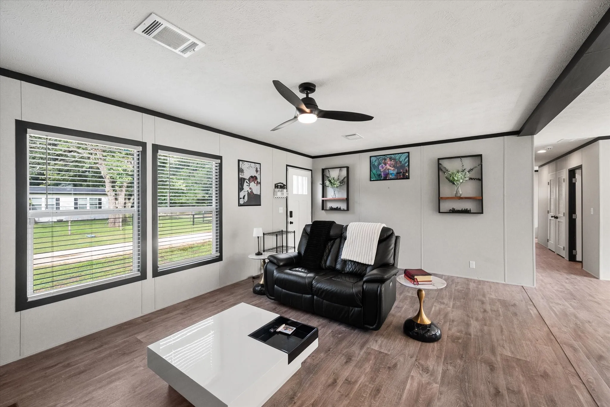 Open living room with ceiling fan