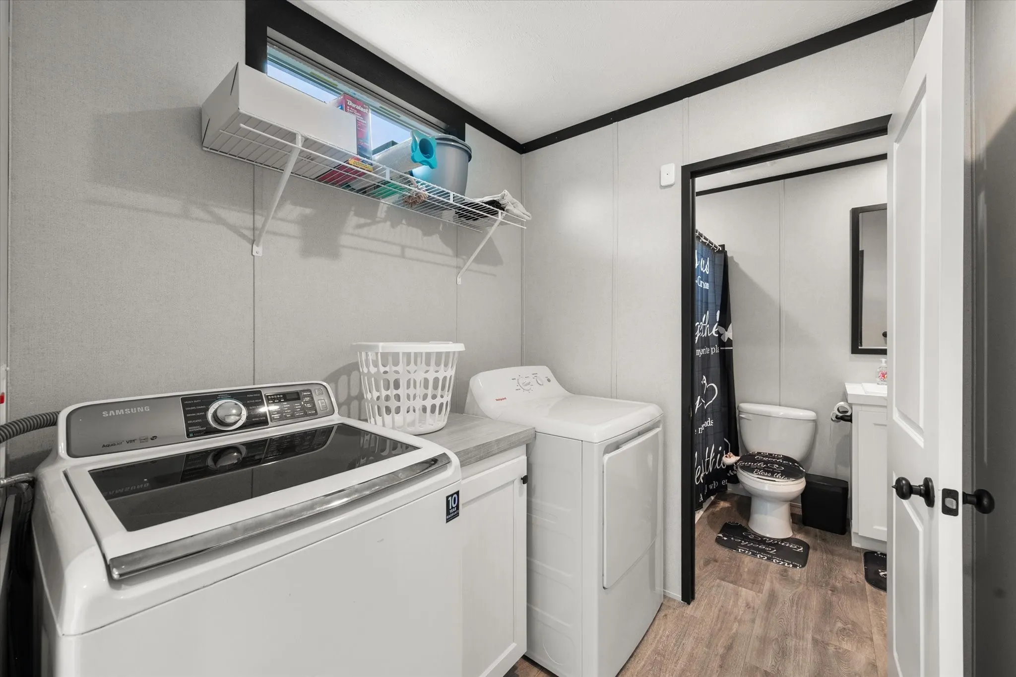 Laundry room connects to the secondary bathroom.