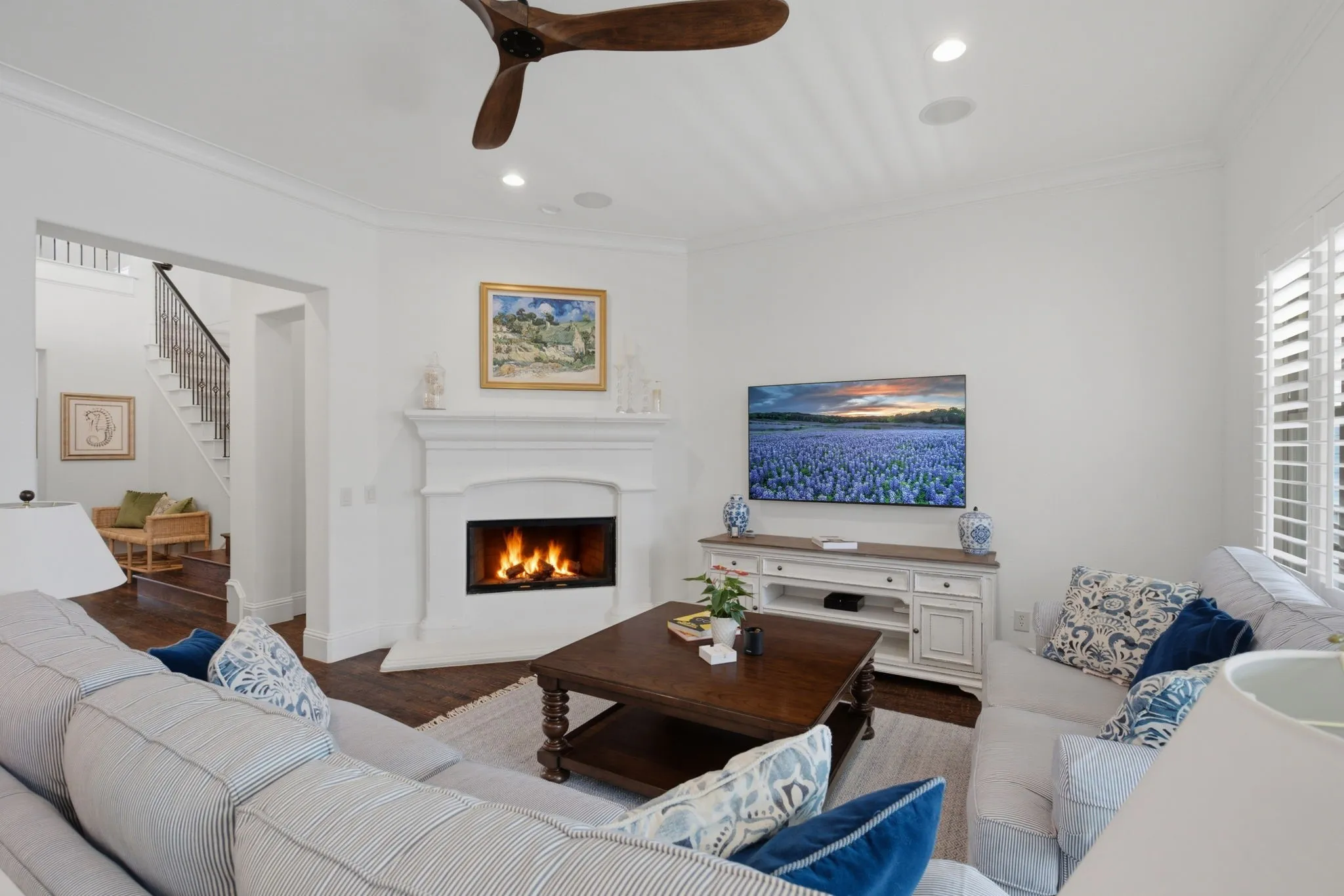 The entry foyer flows seamlessly into the centrally located, open-concept family room, creating an ideal space for comfortable living and effortless entertaining.