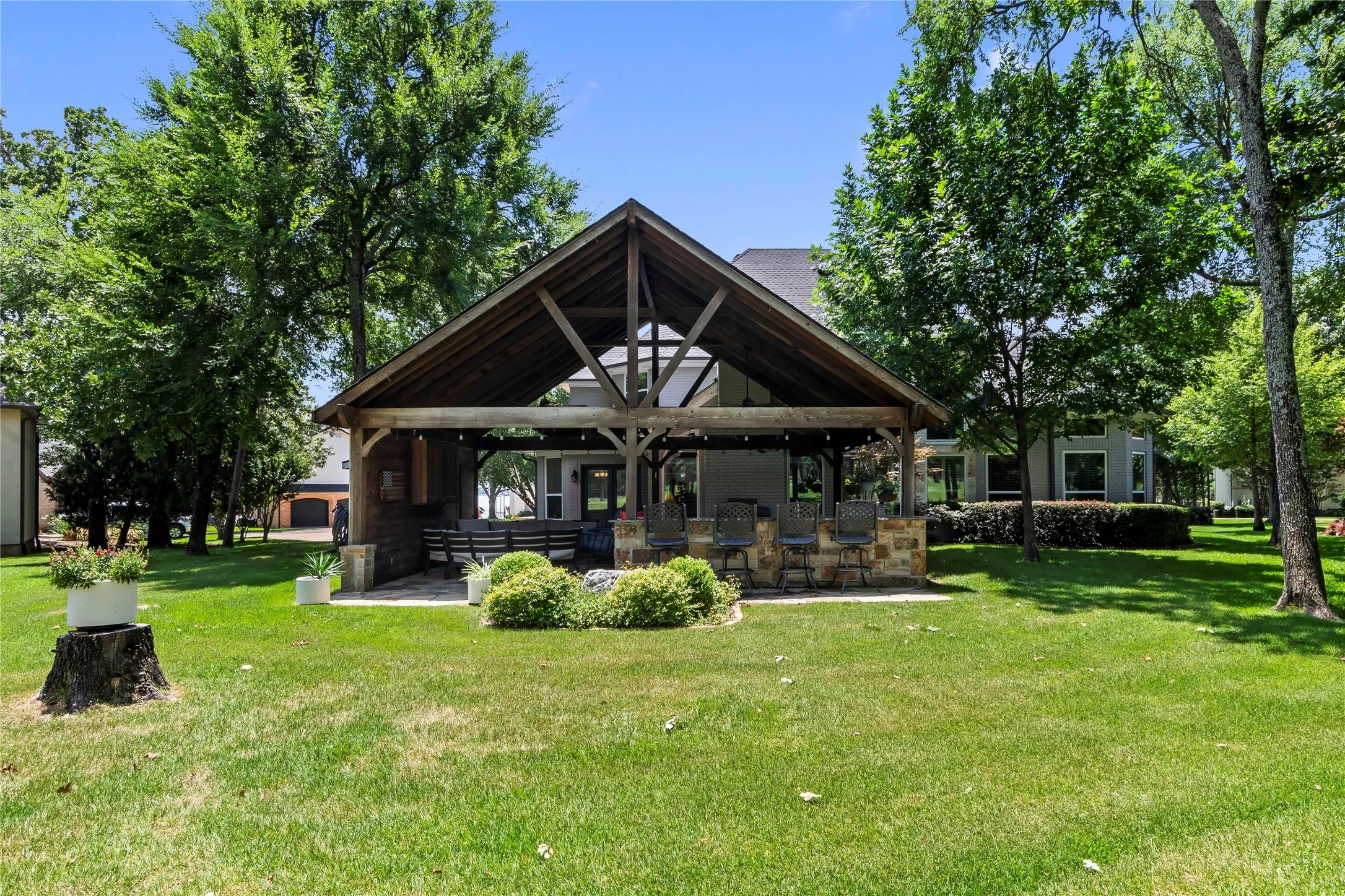 Backyard with fabulous covered patio and outdoor kicthen