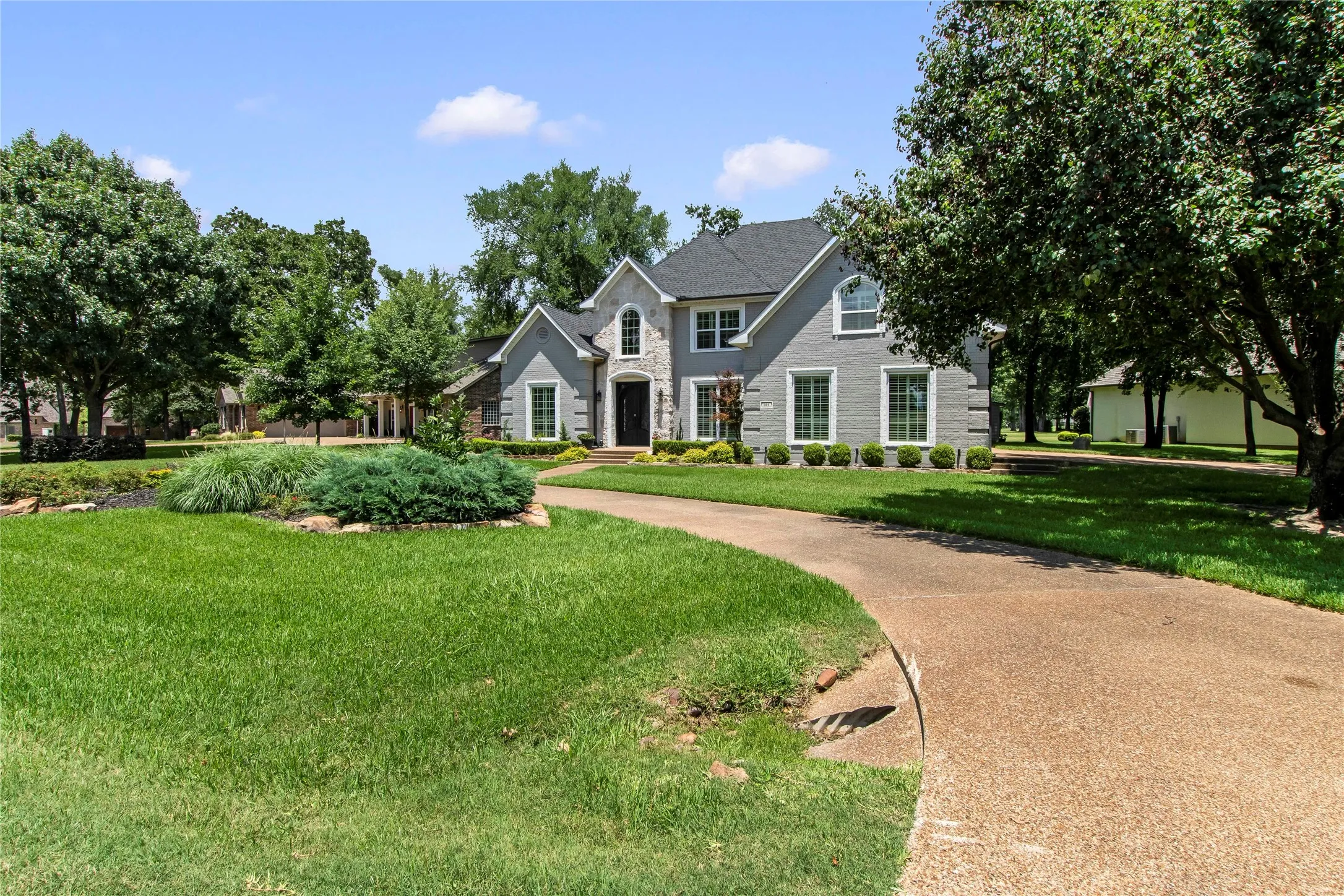 Front of home with circle drive