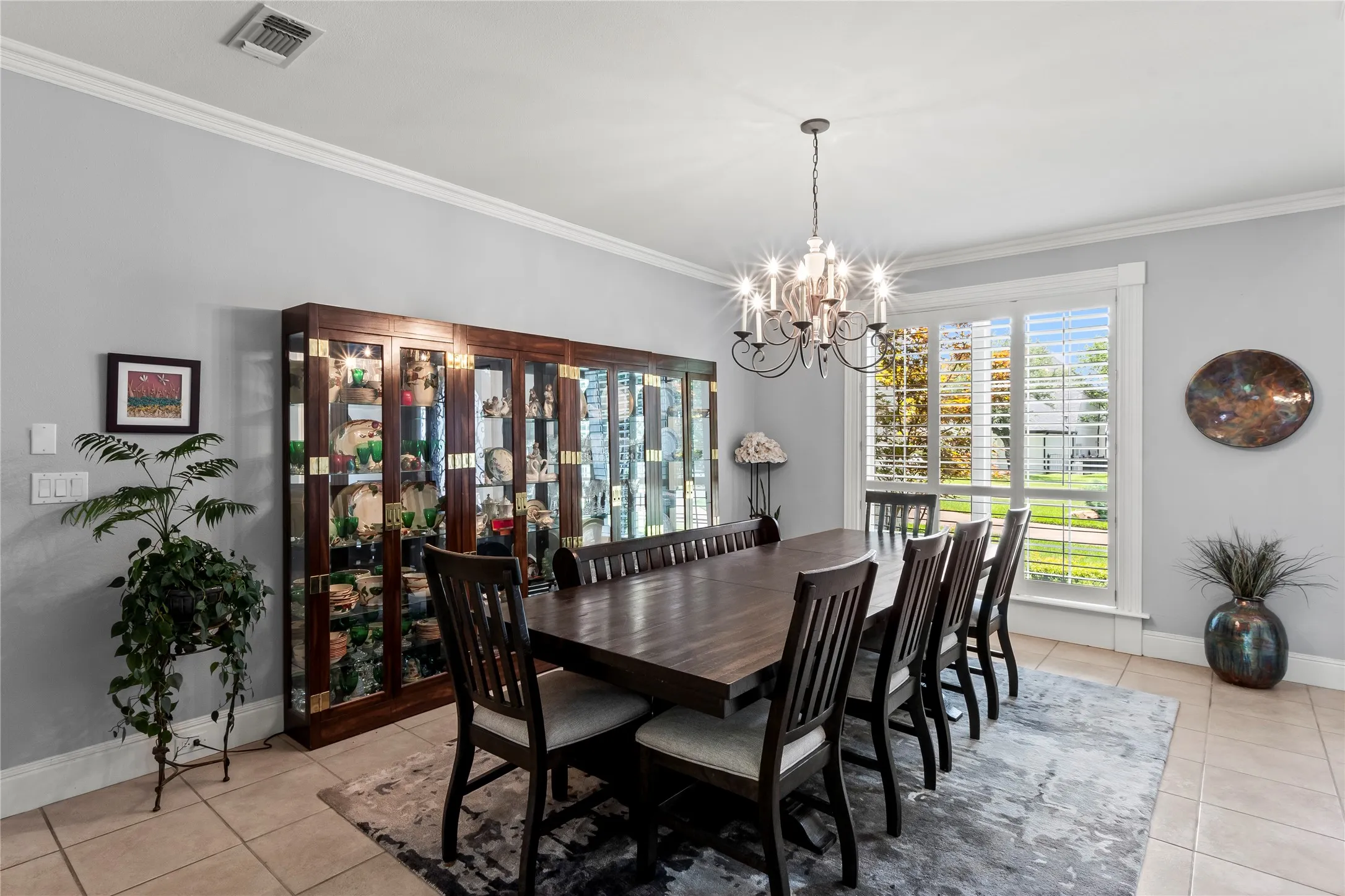 Open dining area with plantation shutters