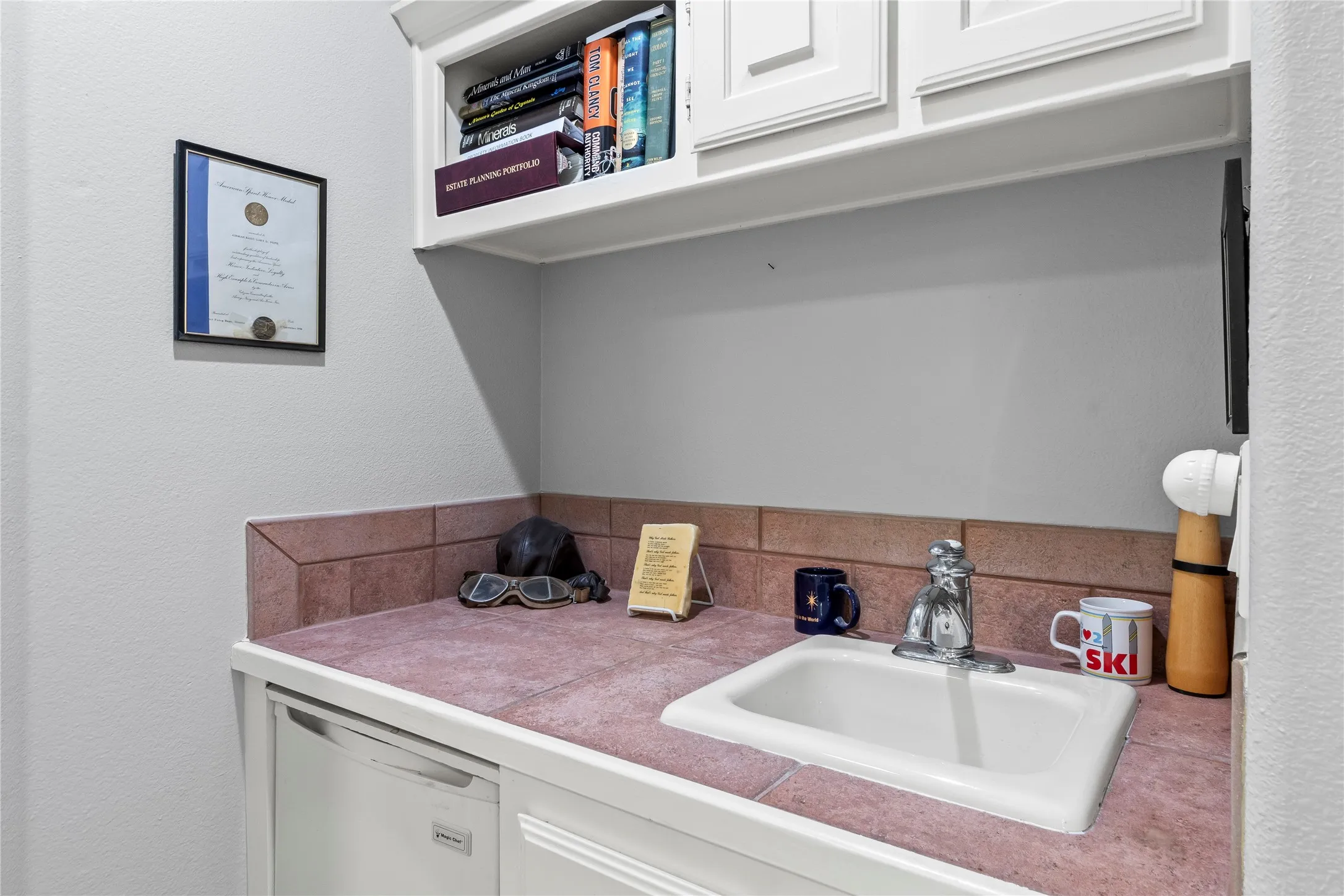 wet bar upstairs off of 3rd living area with beverage refrigerator