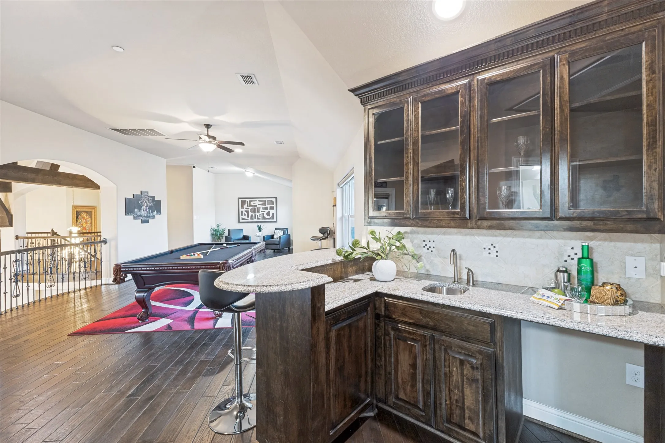 Huge gameroom, sitting area and wet bar.