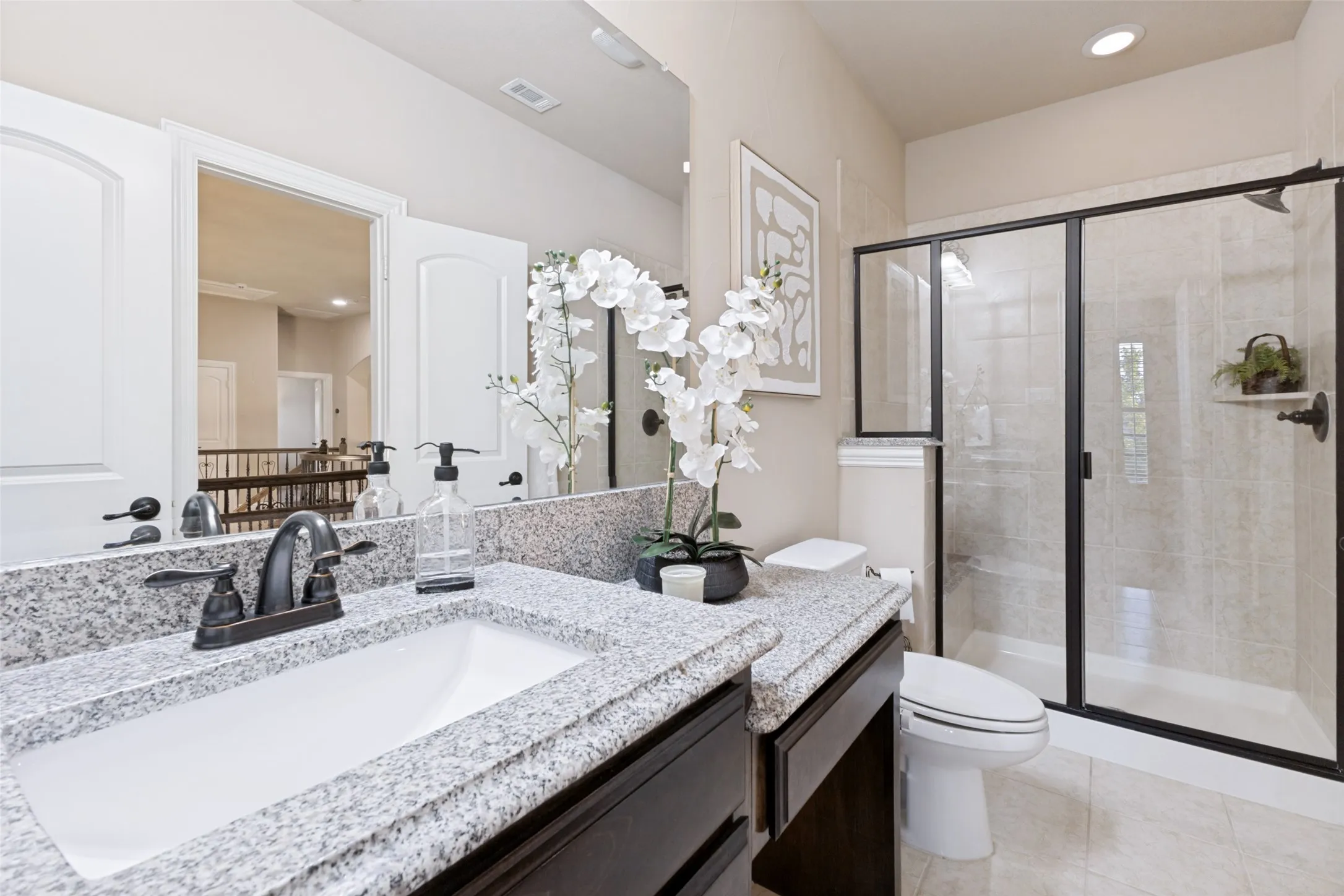 Ensuite bathroom with large walk in shower.