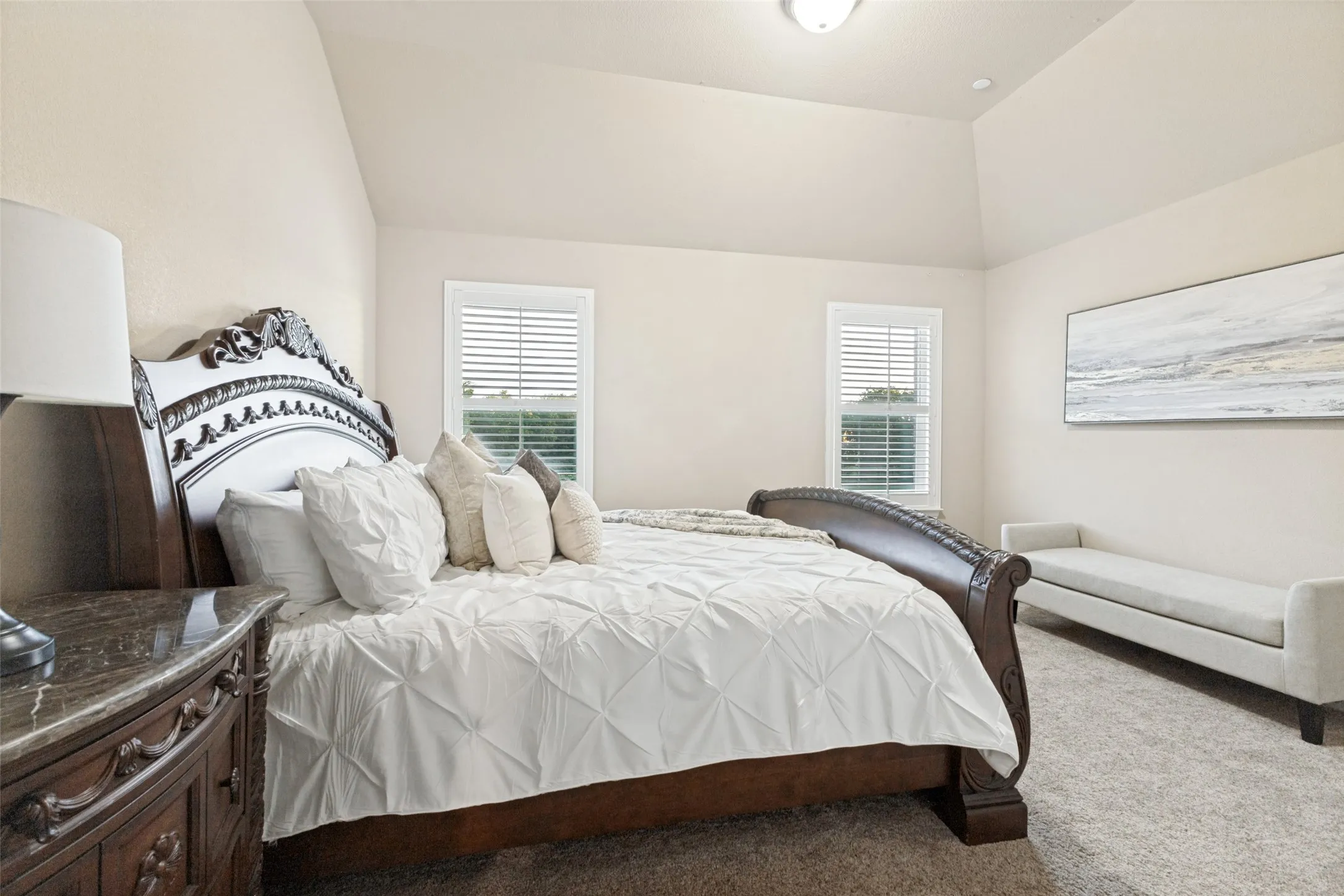 Guest room at the top of the back stair case with walk-in closet.