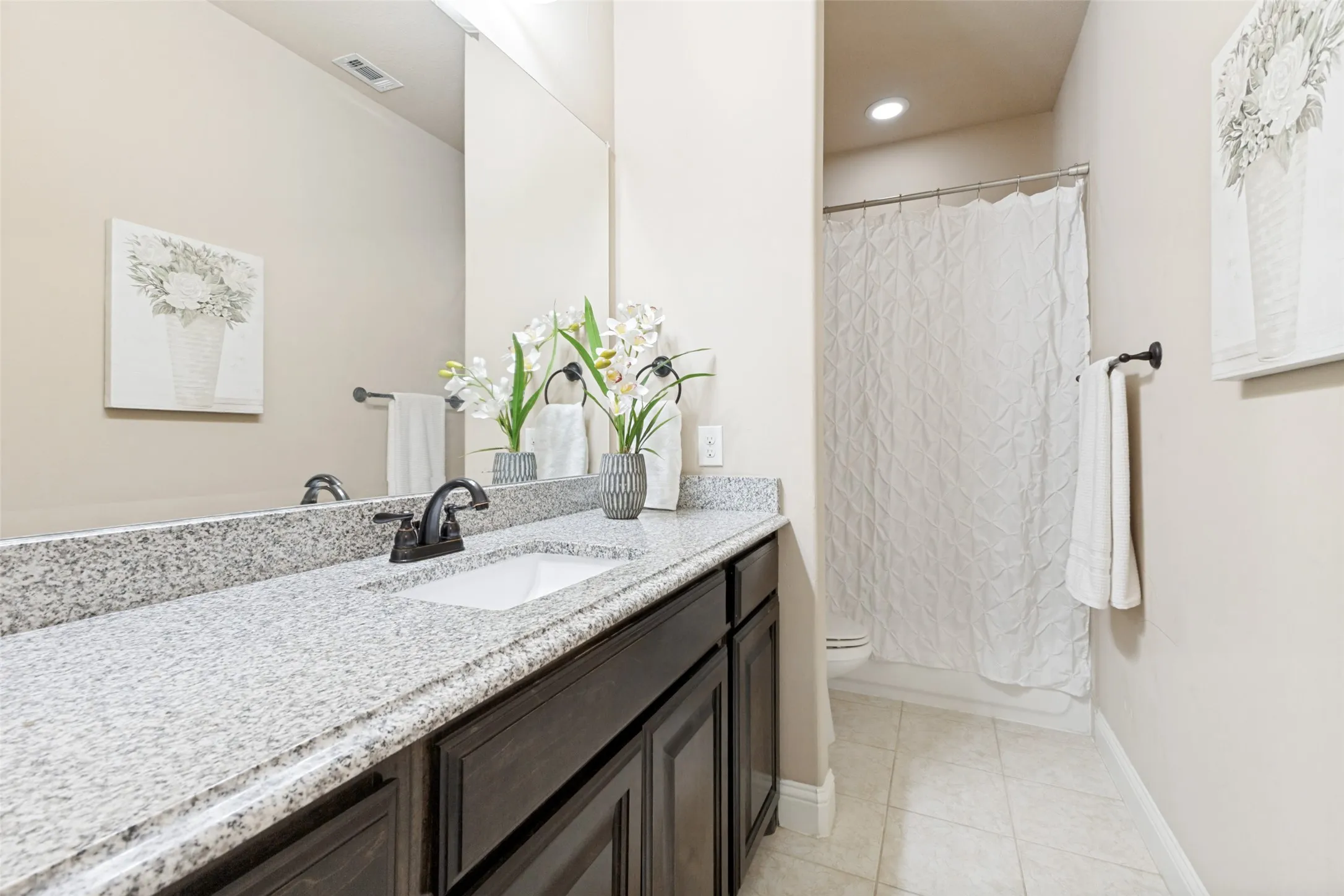 Guest bathroom with easy access from the media room and game room.